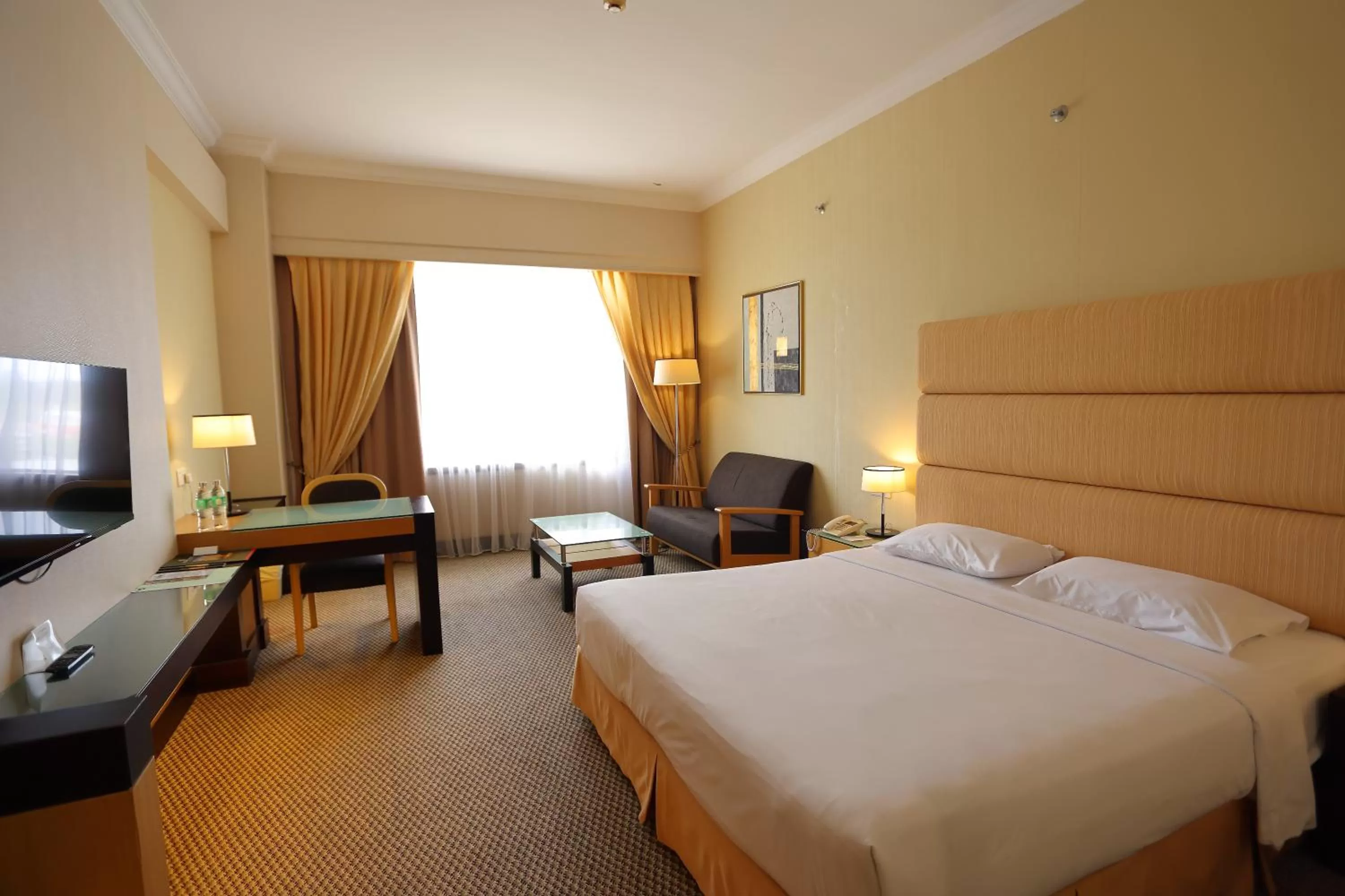 Bed in Dynasty Hotel Miri