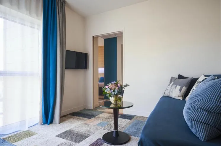 Bed in Kyriad Le Mans Est