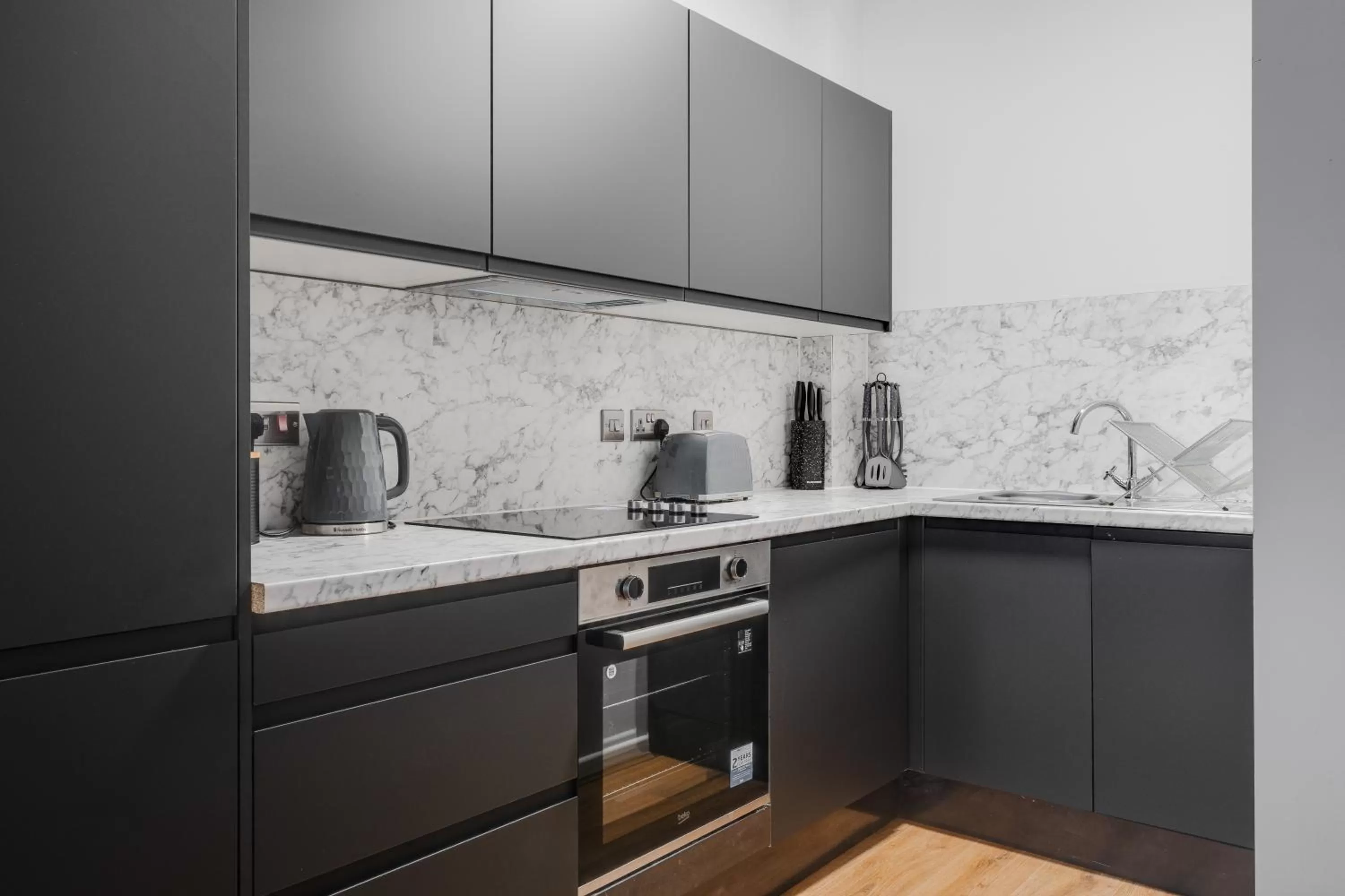 Kitchen or kitchenette in Stanley St Suites By GuestFirst