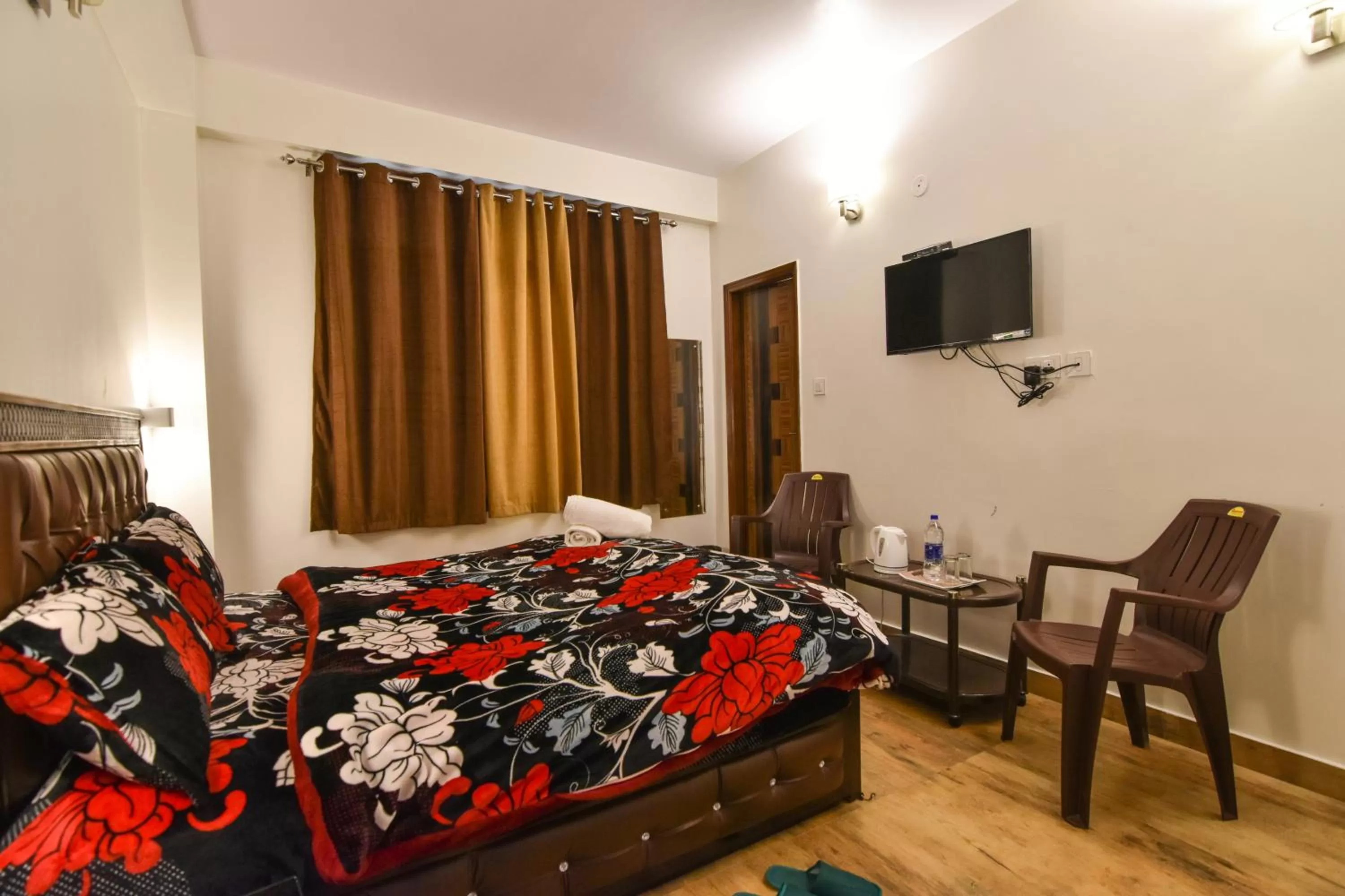 Bedroom, Bed in Dhanlaxmi Apartments