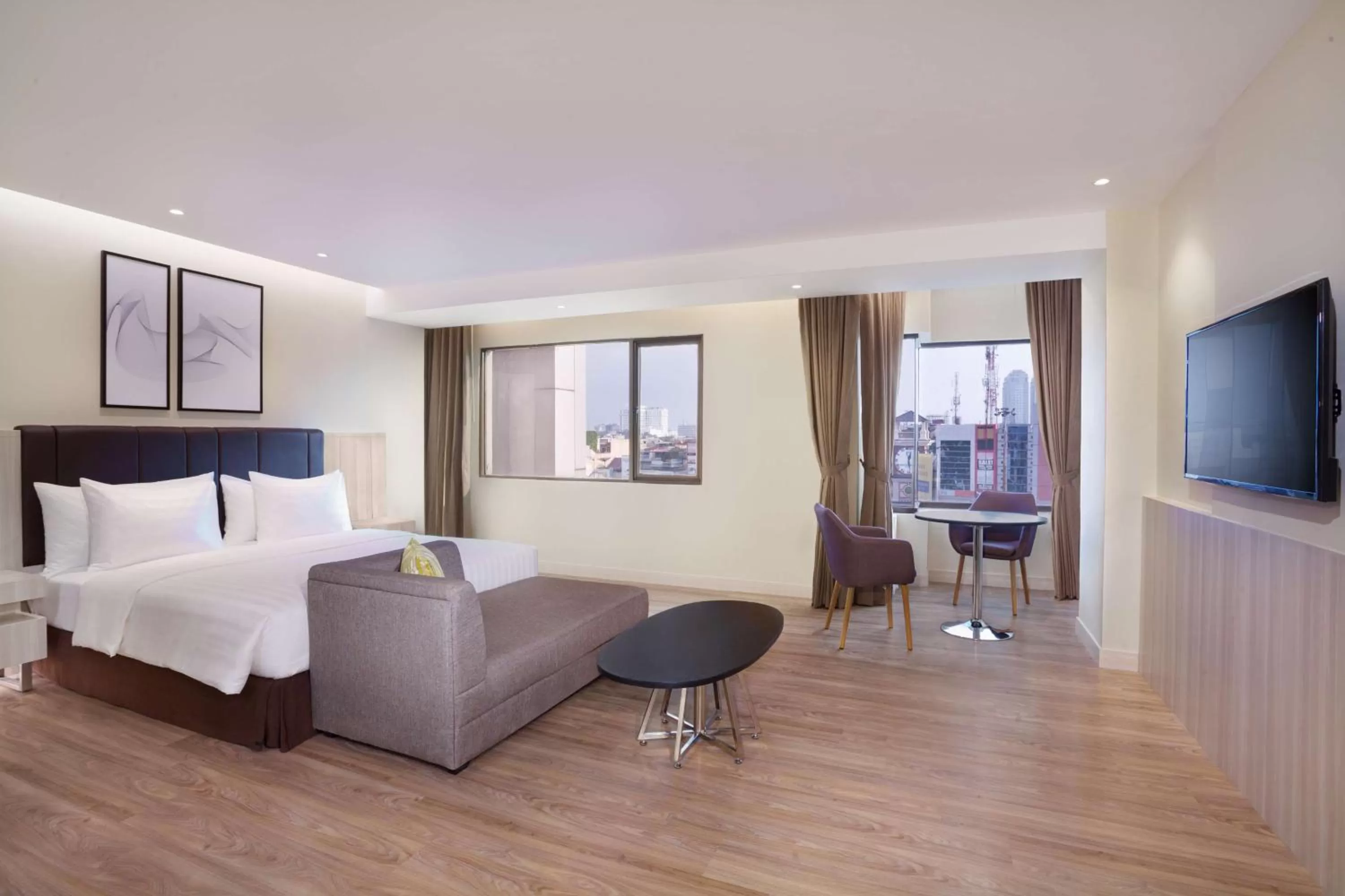 Photo of the whole room, Bed in AIHO Hotel Medan