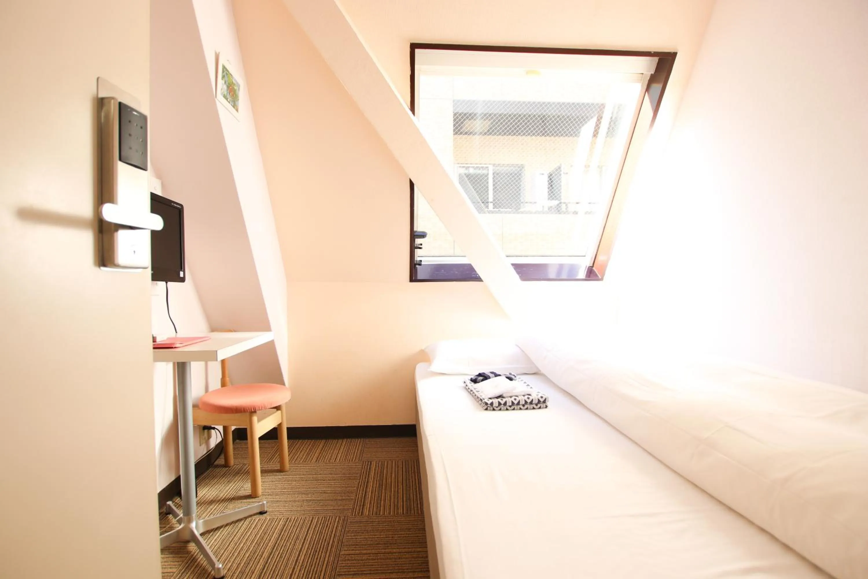 Double Room with Small Double Bed and Shared Bathroom in Sakura Hotel Jimbocho