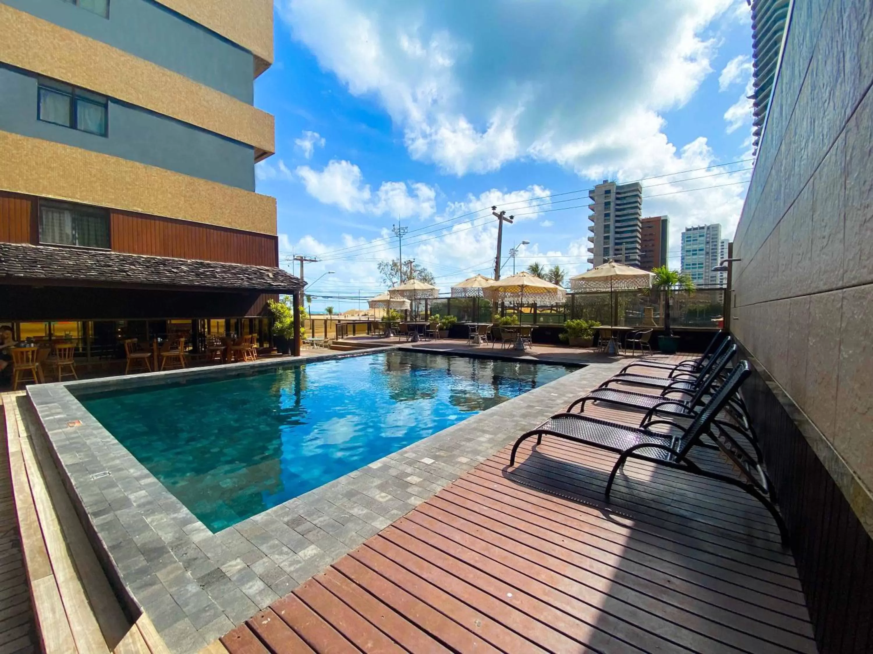 Swimming pool in Magna Praia Hotel