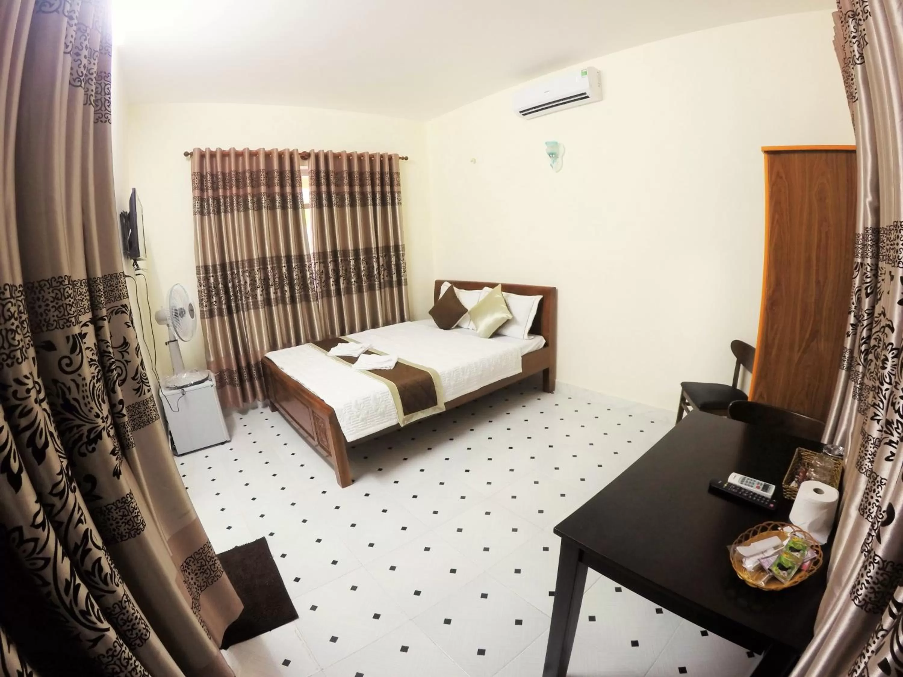 Property building, Bed in Nui Nho Motel