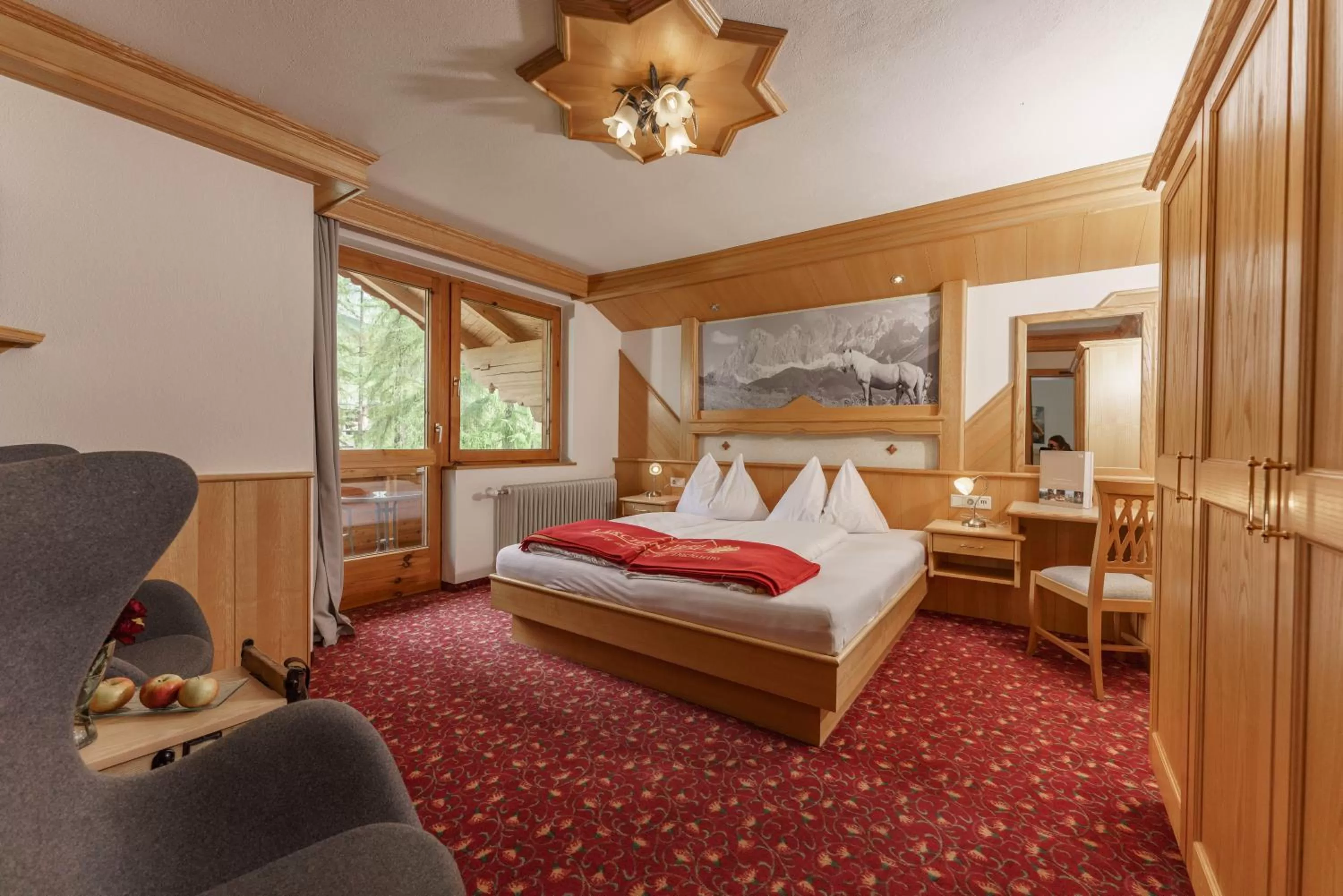 Photo of the whole room, Bed in Naturhotel Lärchenhof