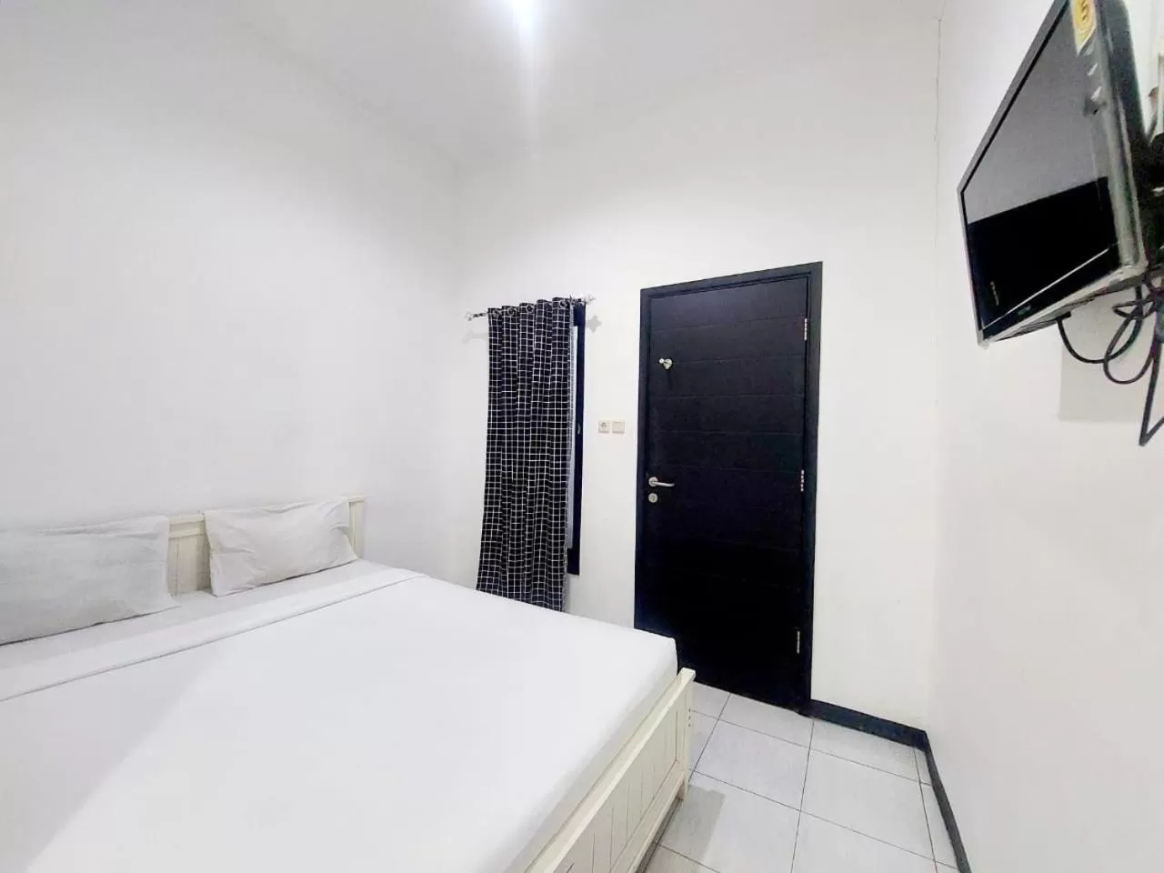 Bed in COZY STAY KUPANG