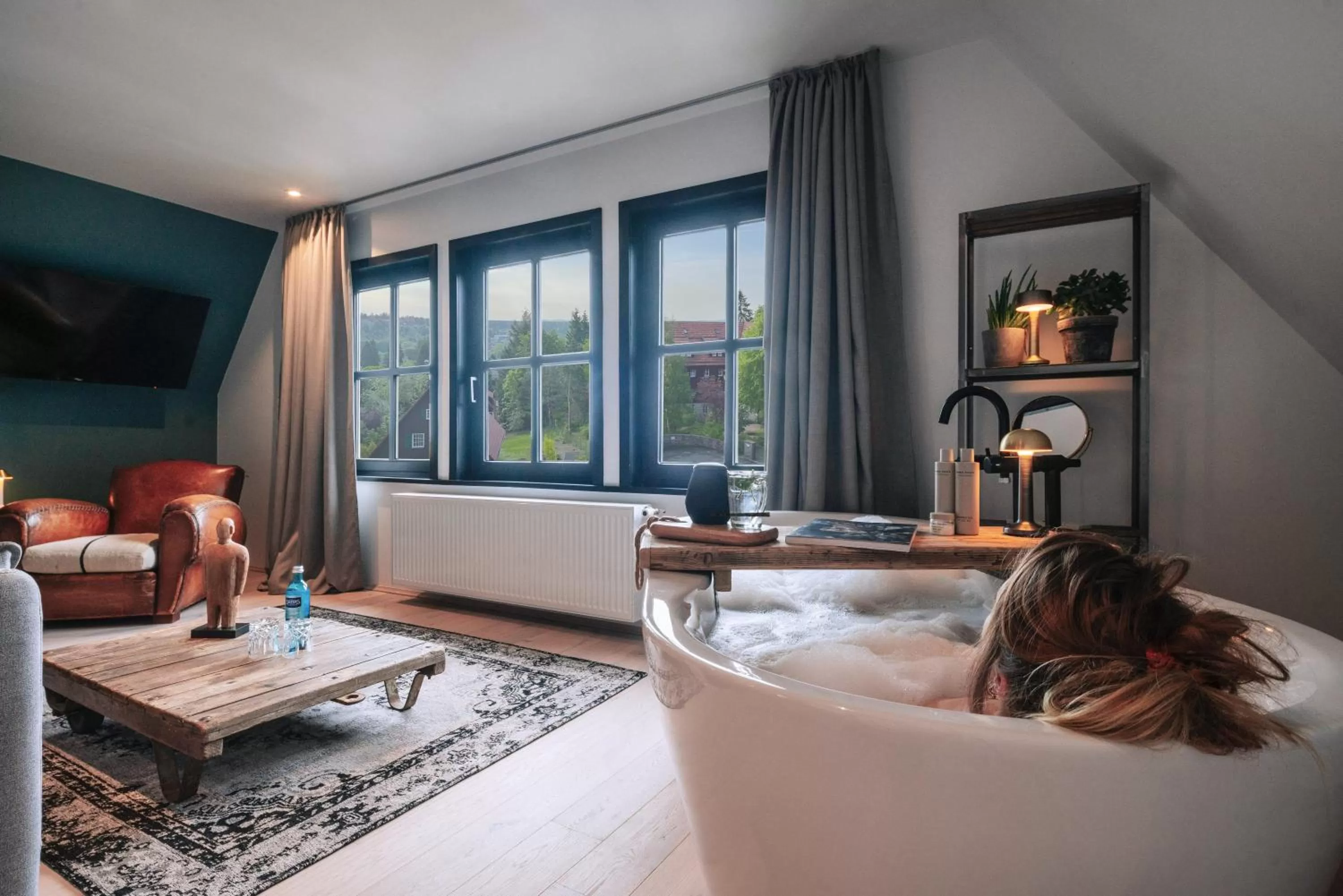 Living room, Bed in THE HEARTS HOTEL - dein Boutique- und Event-Resort