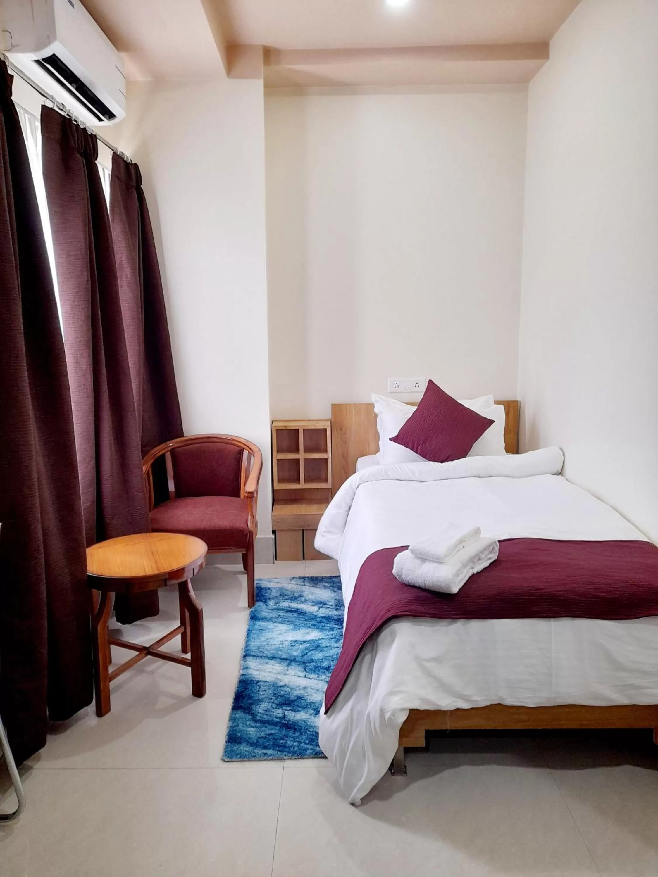 Bed in Bharalu Residency