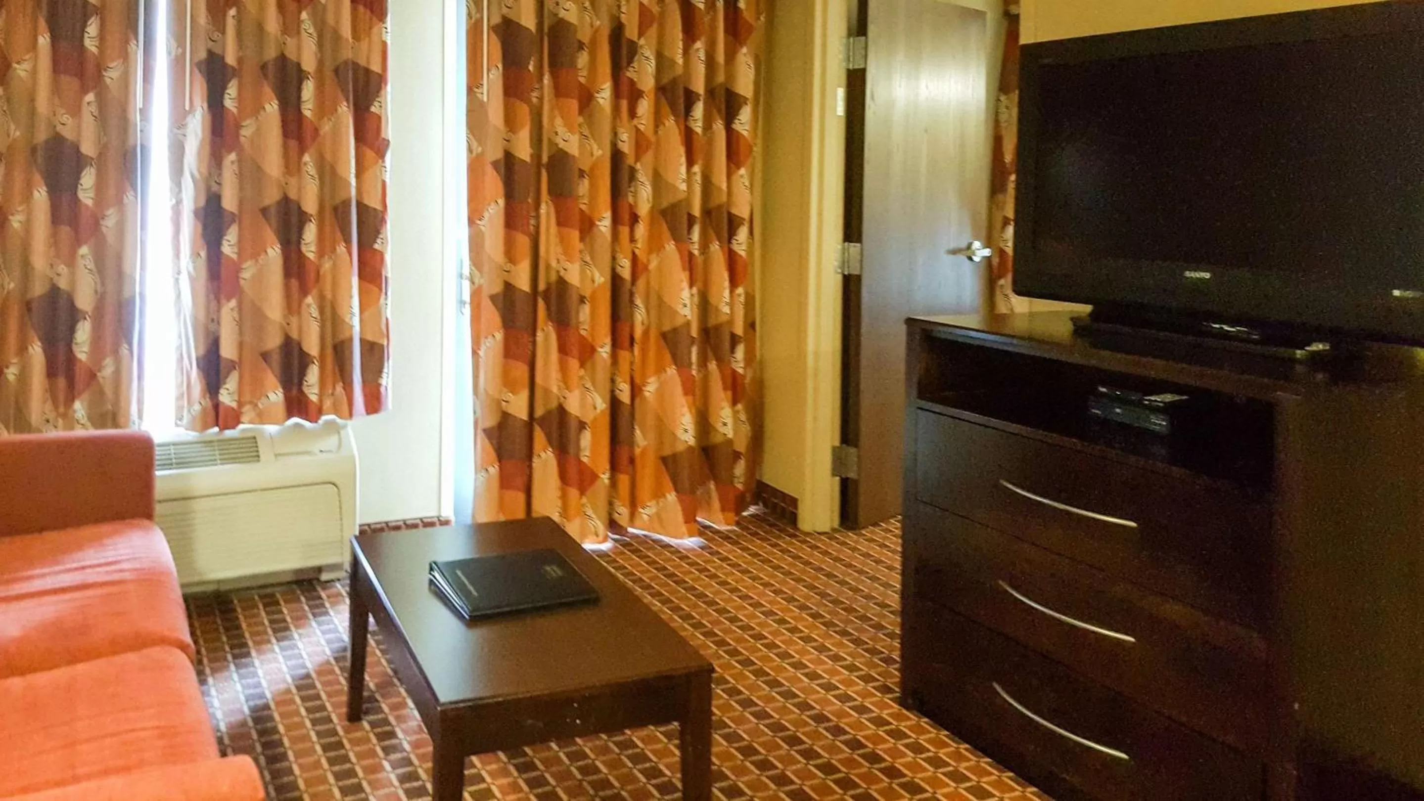 Photo of the whole room in Affordable Suites of America Rogers - Bentonville