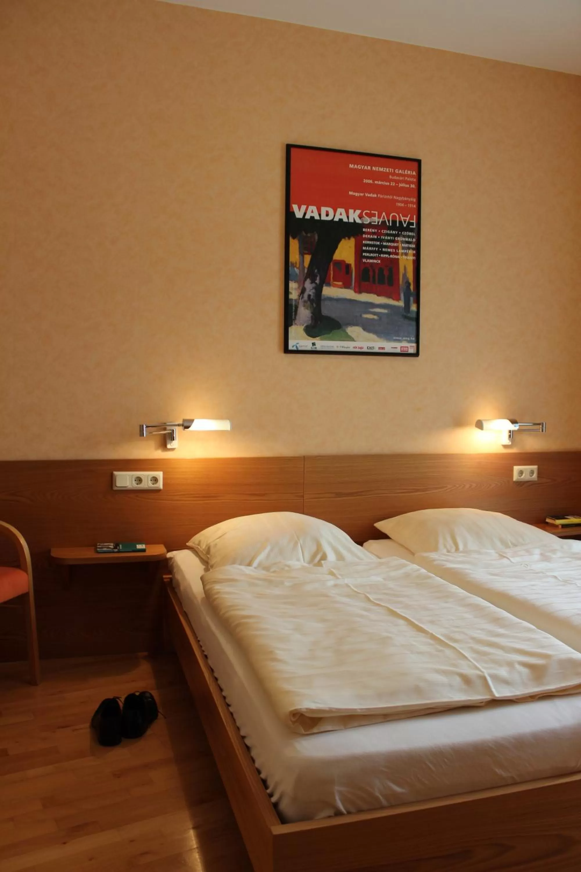 Bed in An der Persiluhr Stadt-gut-Hotel