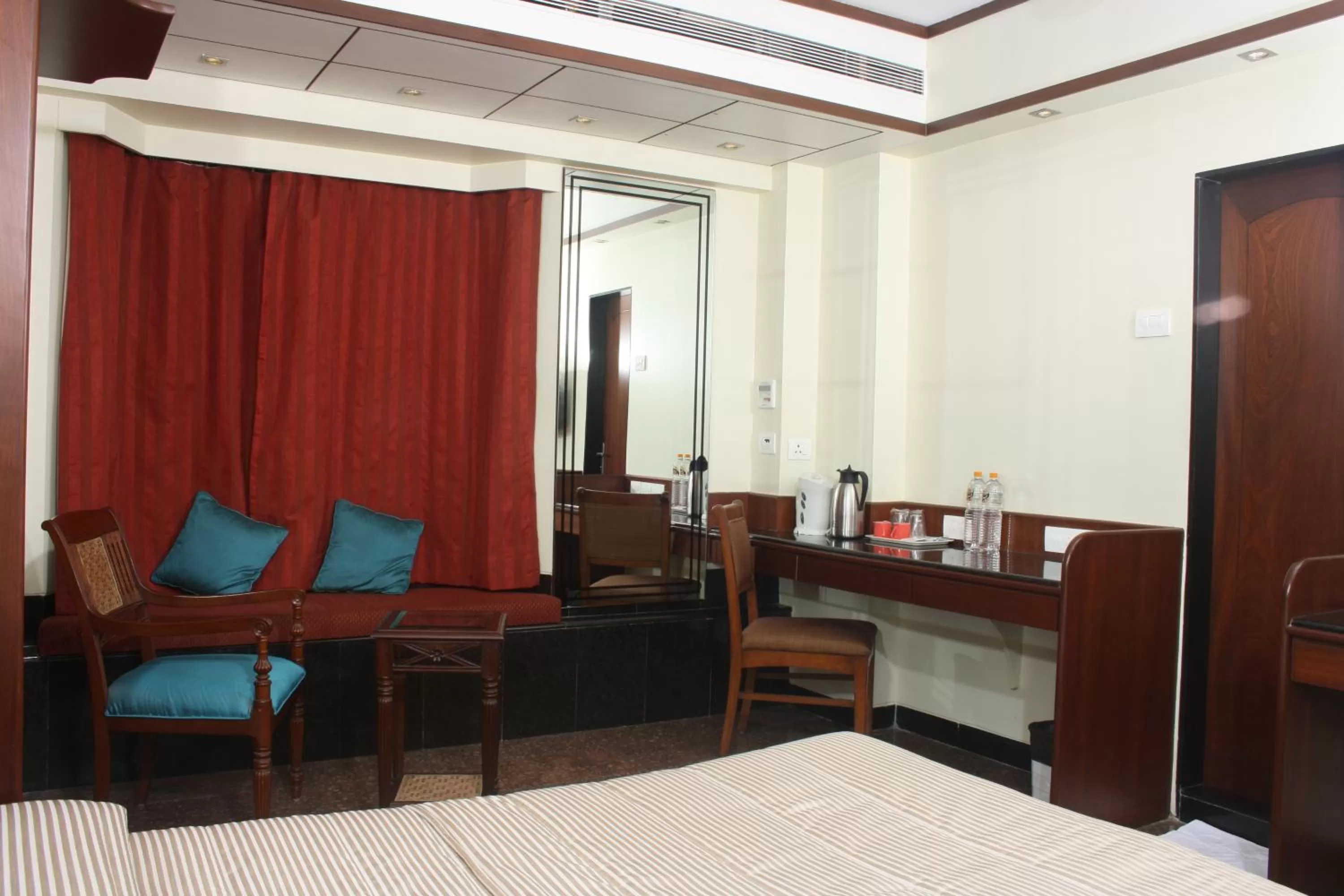 Bed in Hotel Karl Residency