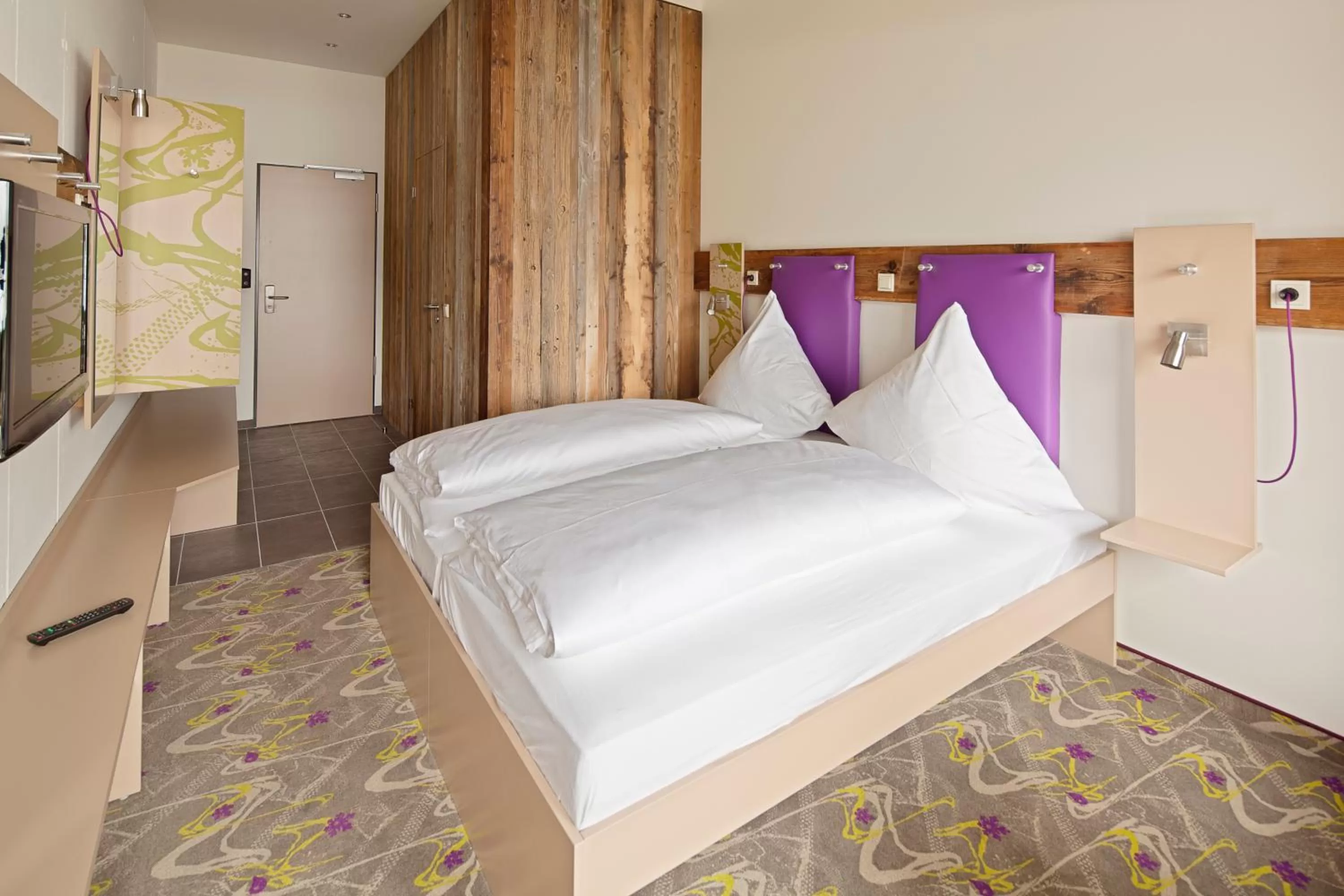 Photo of the whole room, Bed in Explorer Hotel Kitzbühel