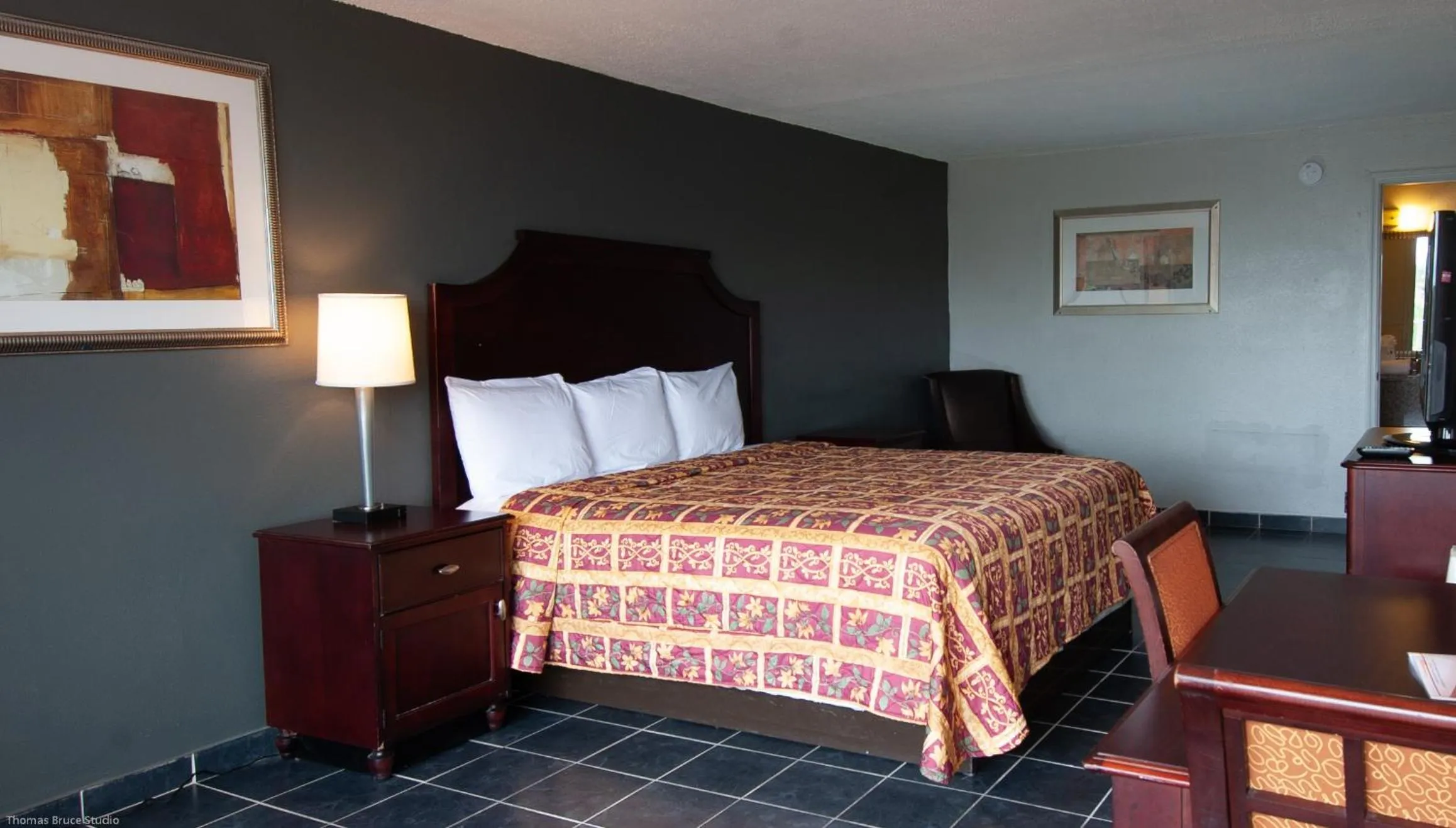 Bed in Express Inn & Suites - 5 Miles from St Petersburg Clearwater Airport