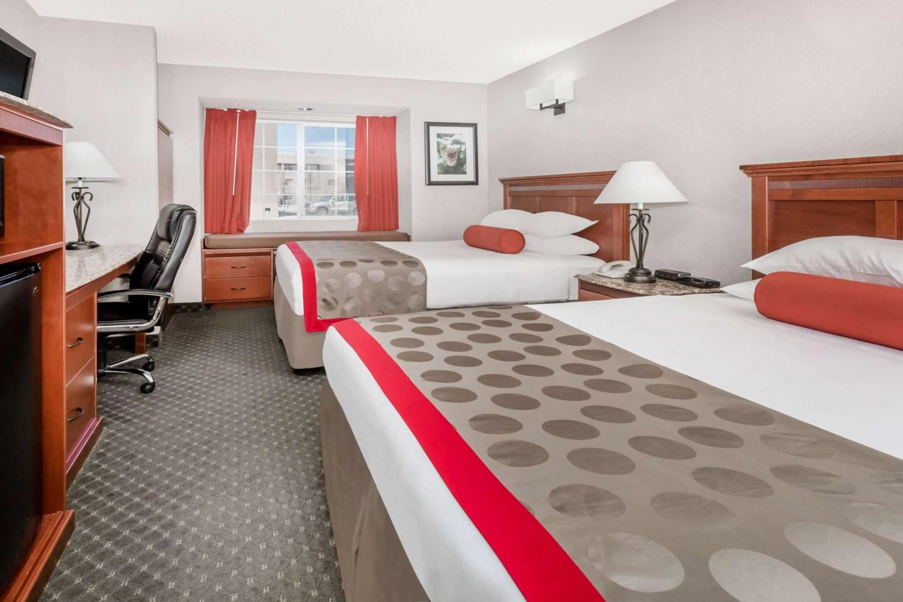 Photo of the whole room, Bed in Ramada by Wyndham Frisco