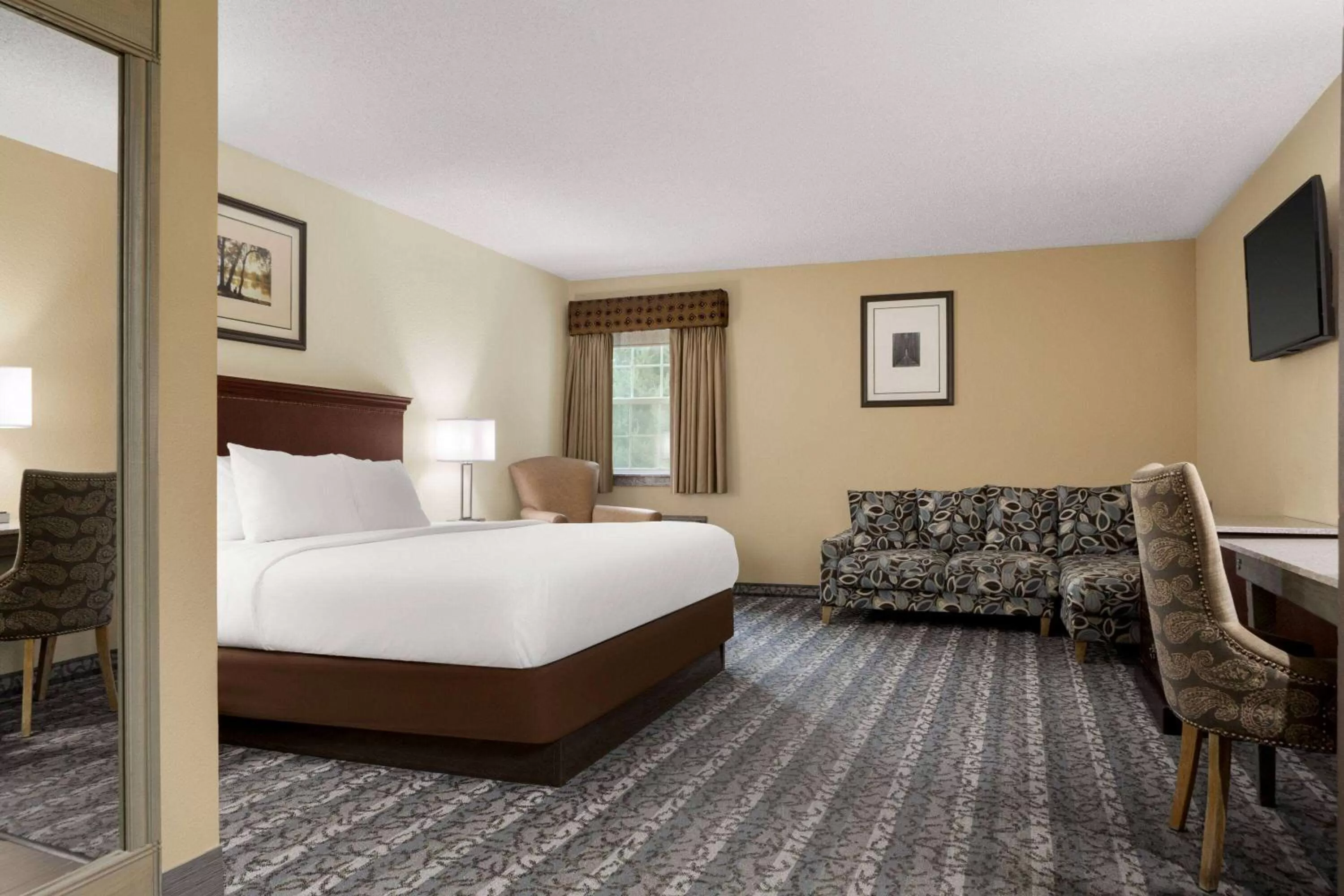 Photo of the whole room, Bed in Travelodge by Wyndham Coffeyville