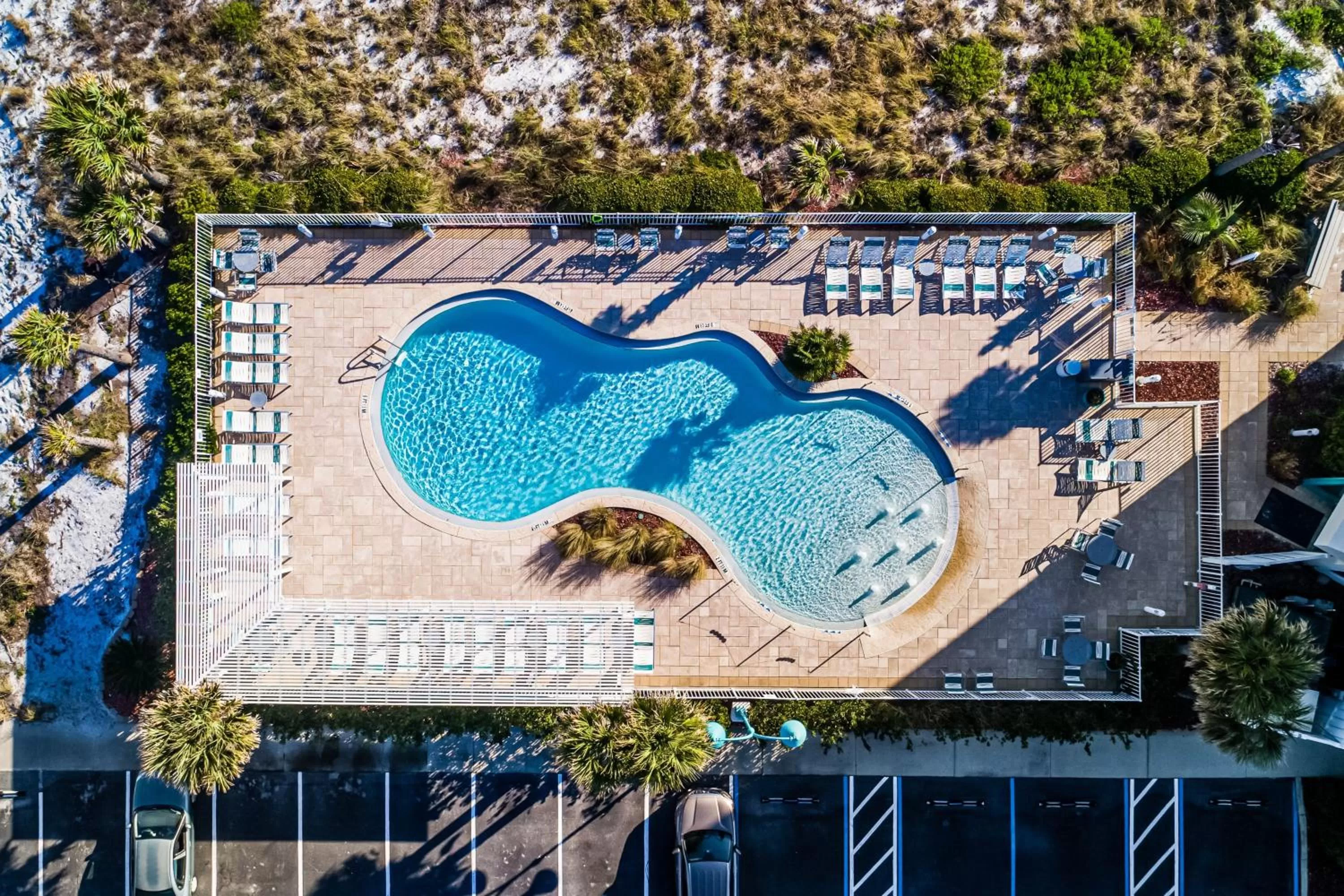 Swimming pool in Holiday Inn Express Pensacola Beach by IHG