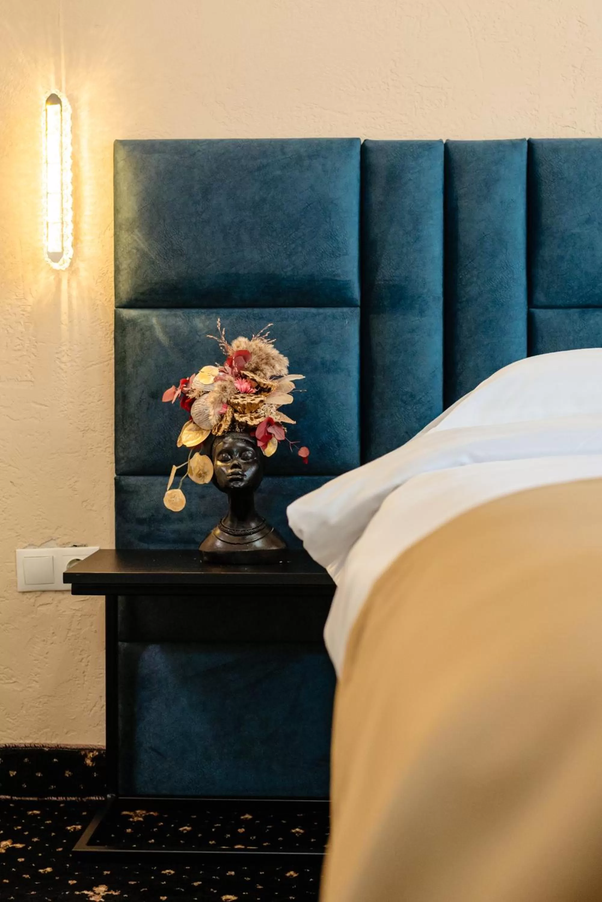 Decorative detail, Bed in Palace Bulevard Inn