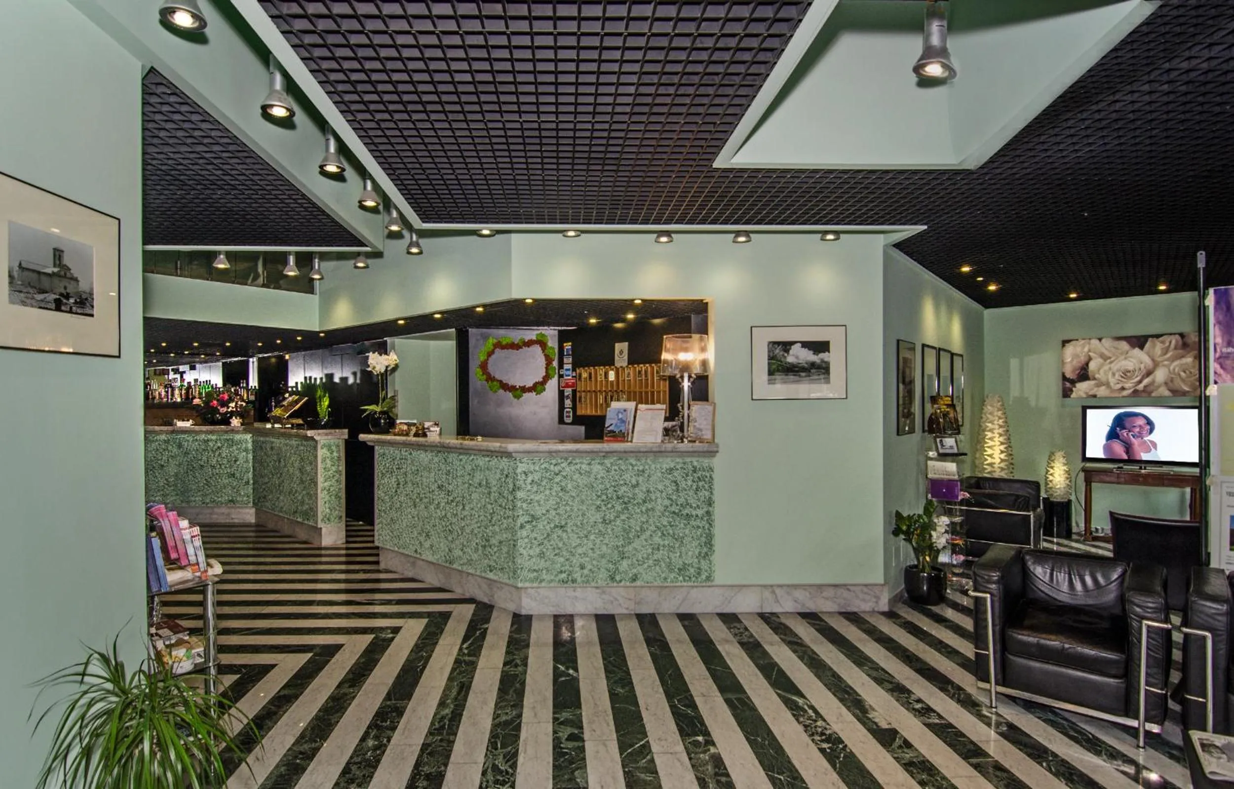 Communal lounge/ TV room in Hotel Rex