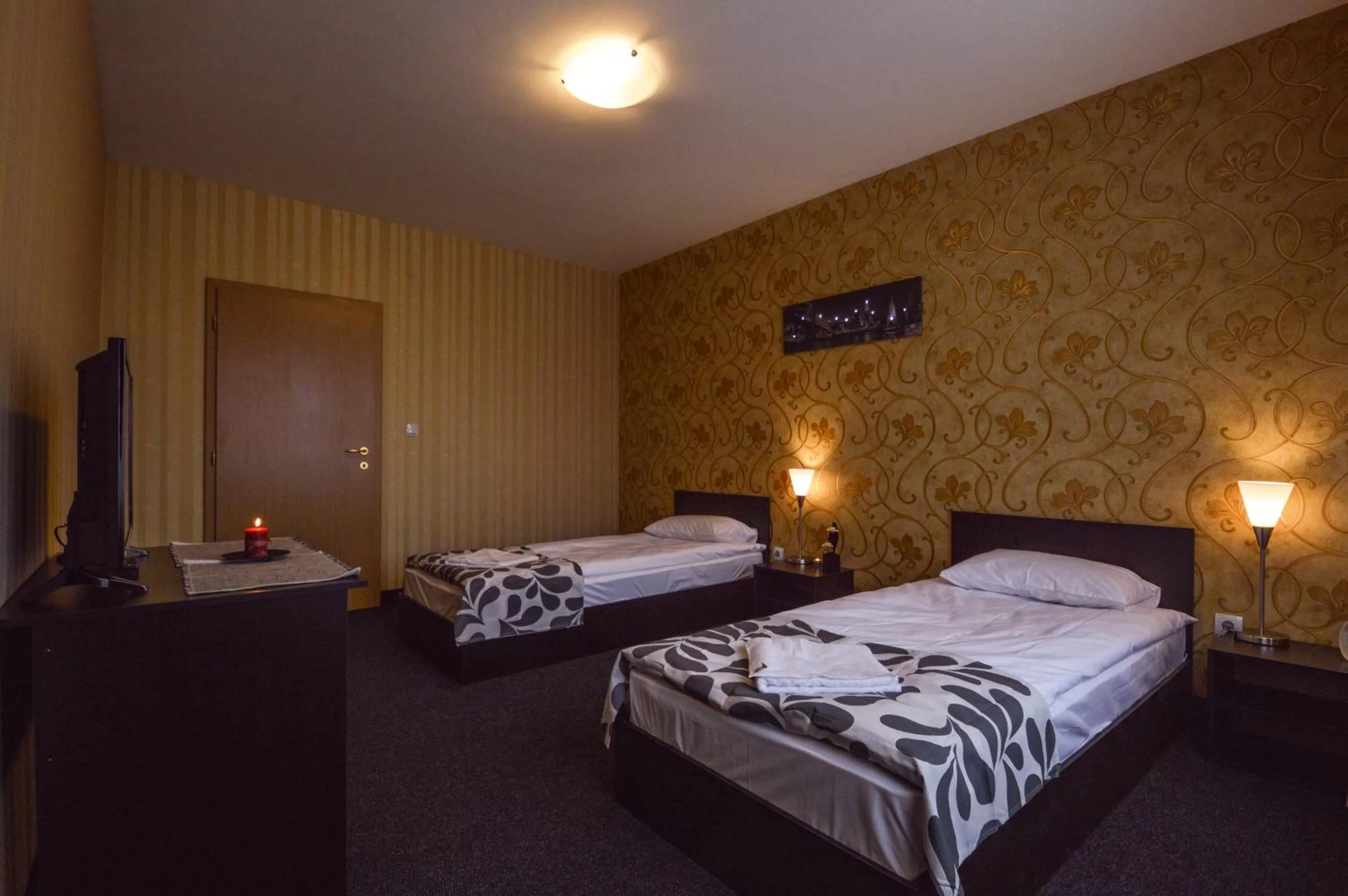 Bed in Elite Spetema Hotel