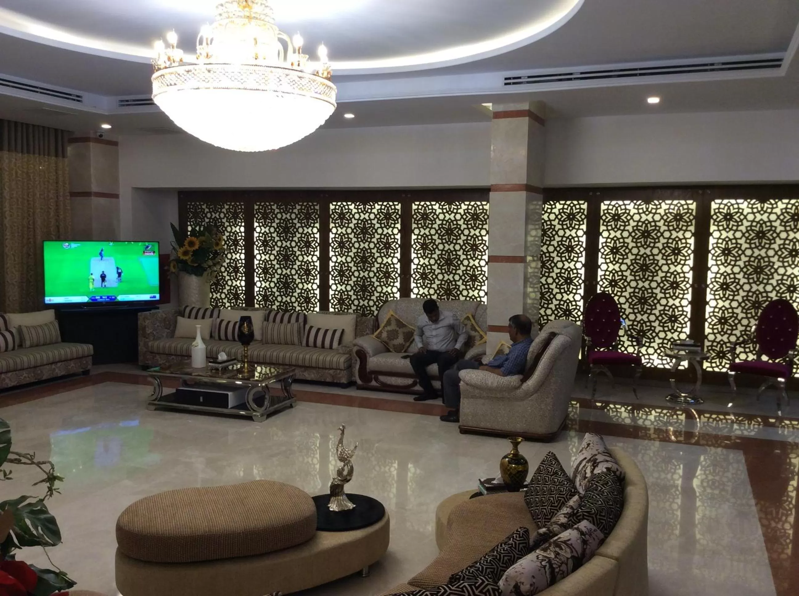 Communal lounge/ TV room in Marino Royal Hotel