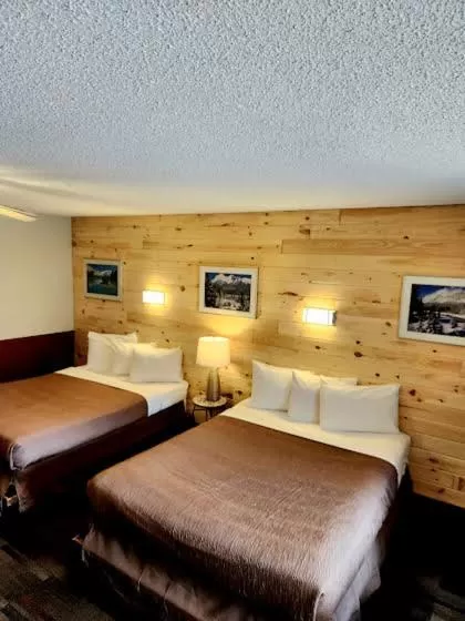 Bed in Rundle Mountain Lodge