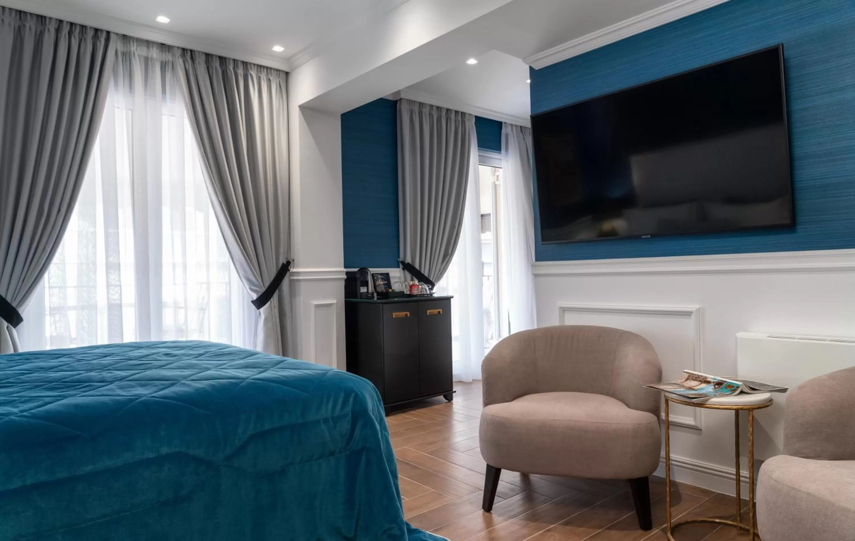 Seating area, Bed in Evripidou Suites