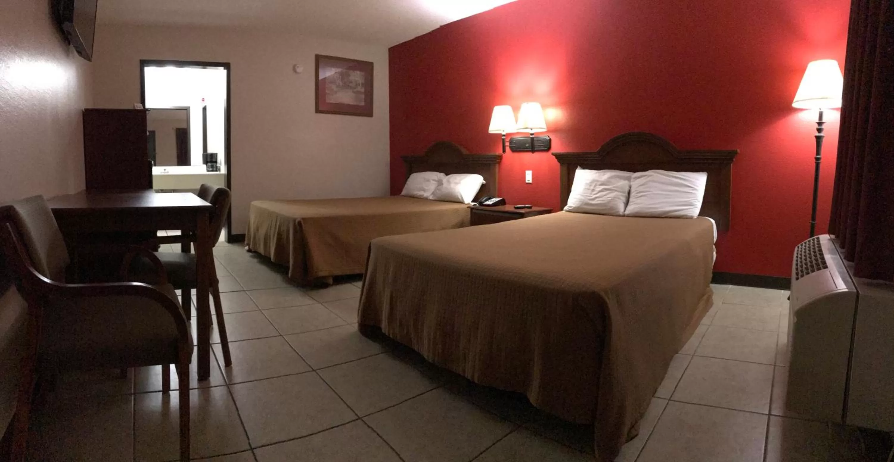 Bed in Relax Inn McRae