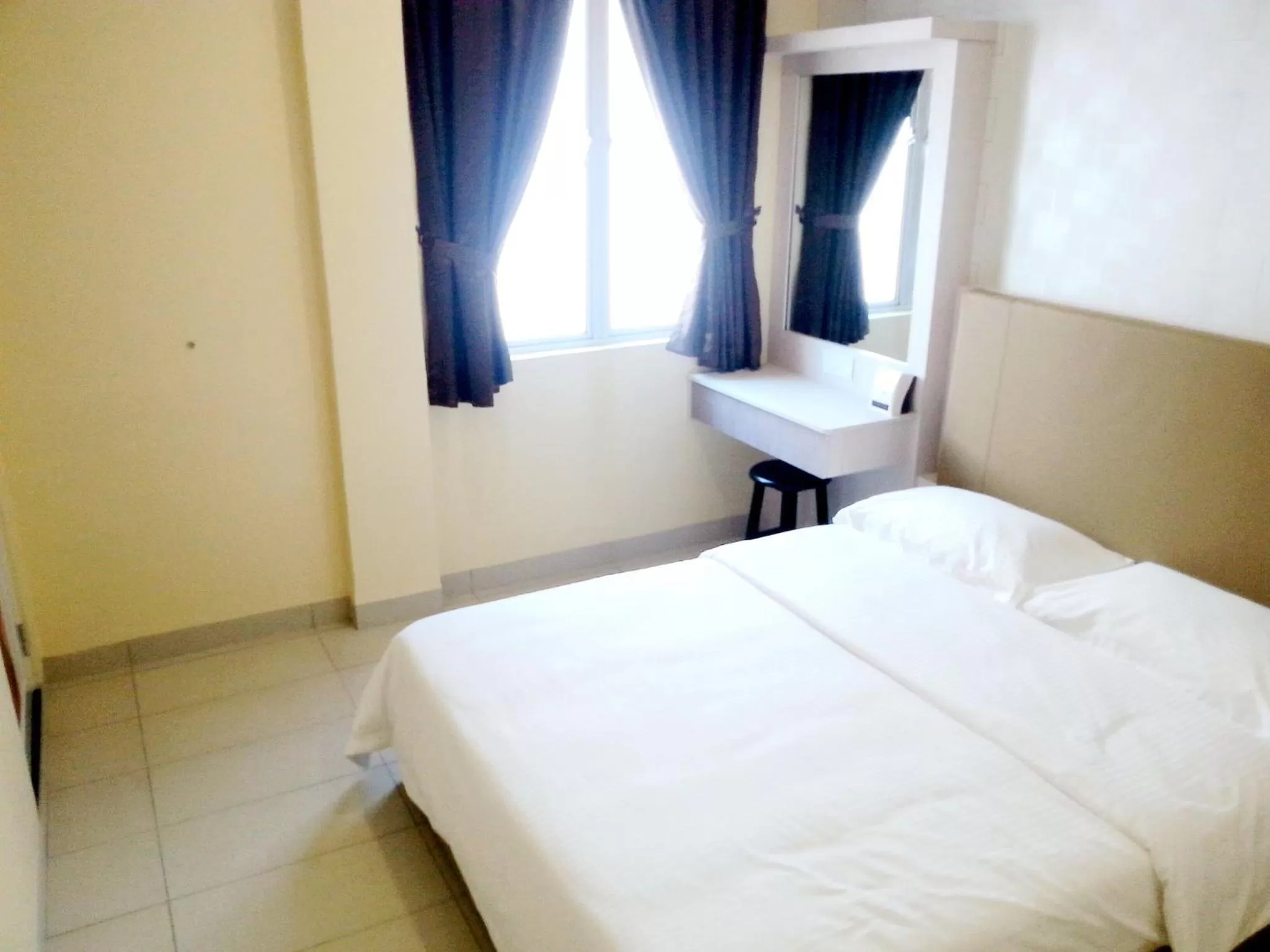 Photo of the whole room, Bed in RG Grand Hotel