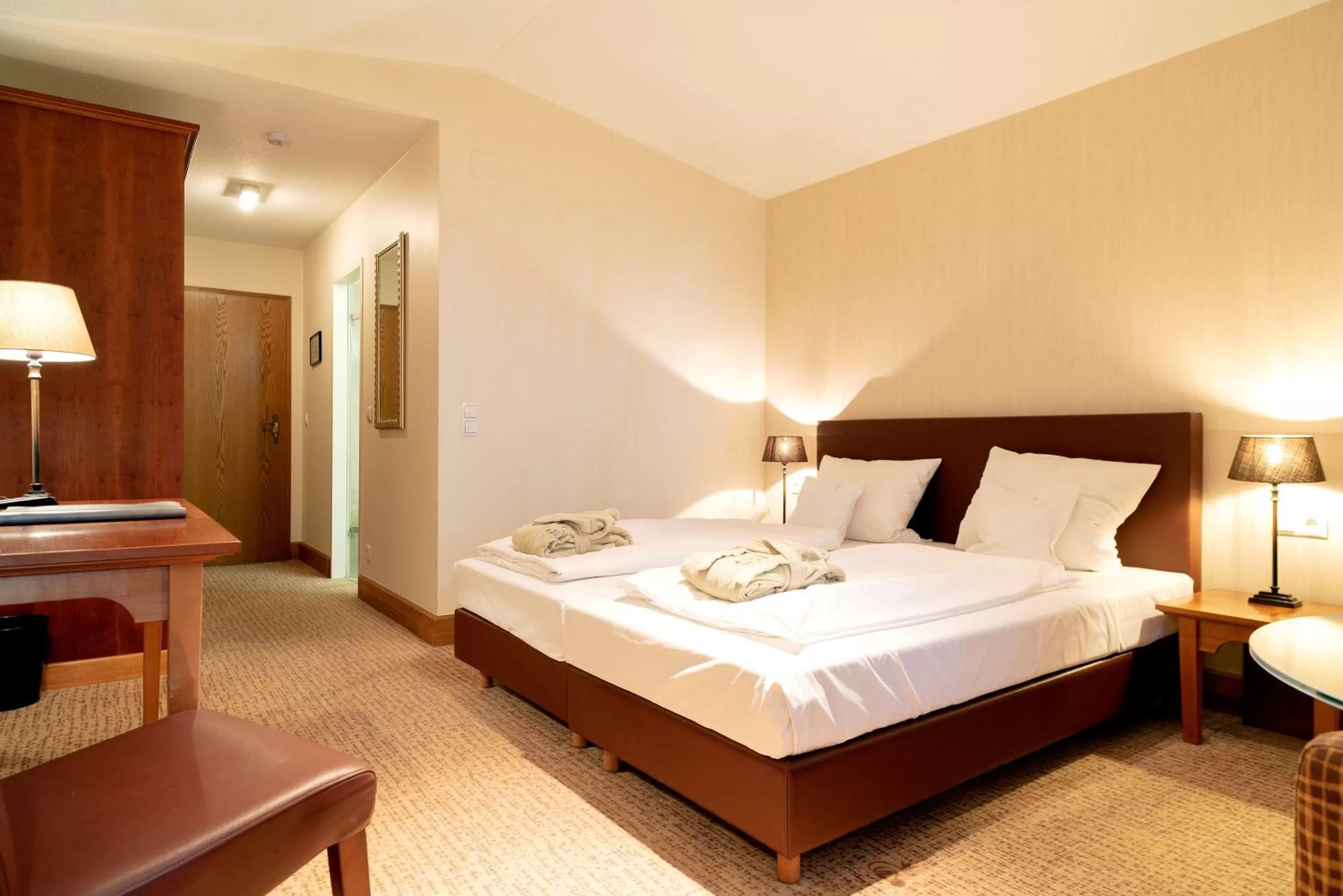 Photo of the whole room, Bed in Waldhotel Tannenhäuschen