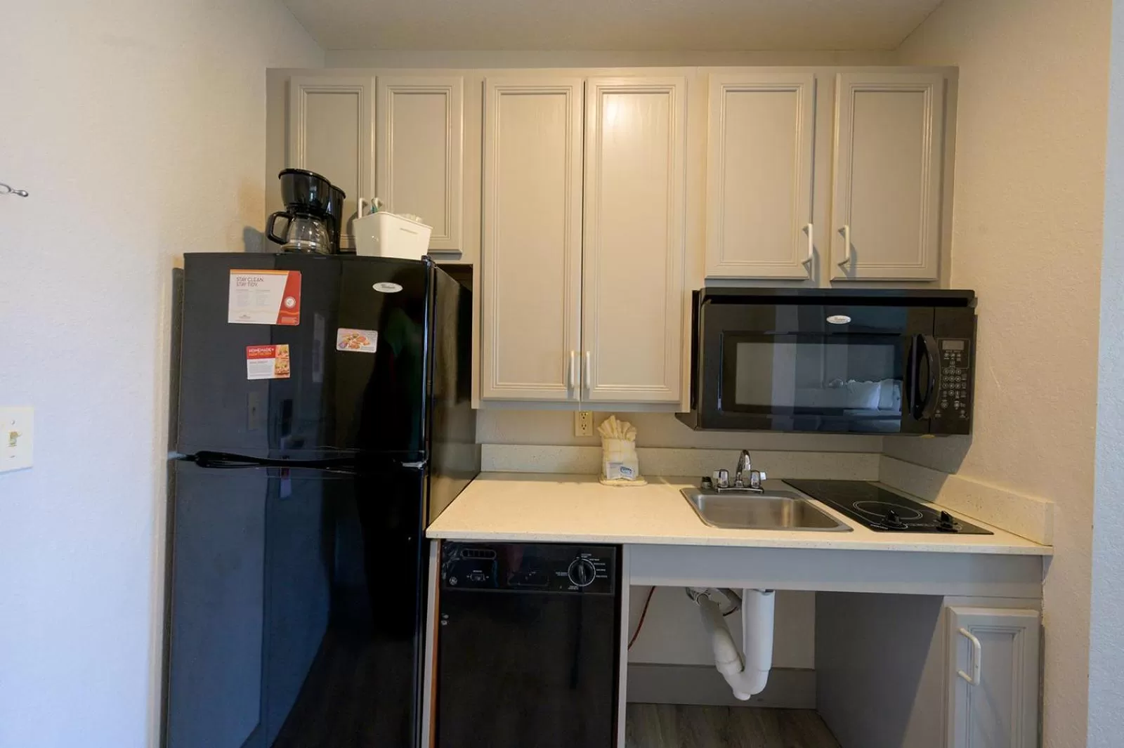 Kitchen or kitchenette in Hawthorn Extended Stay by Wyndham Panama City Beach