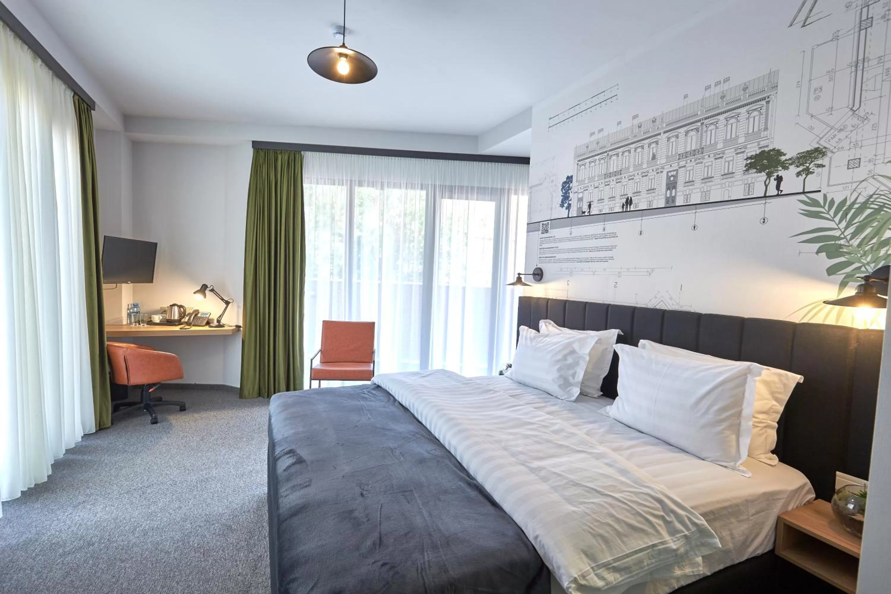 Bed in Graphica Tbilisi Hotel