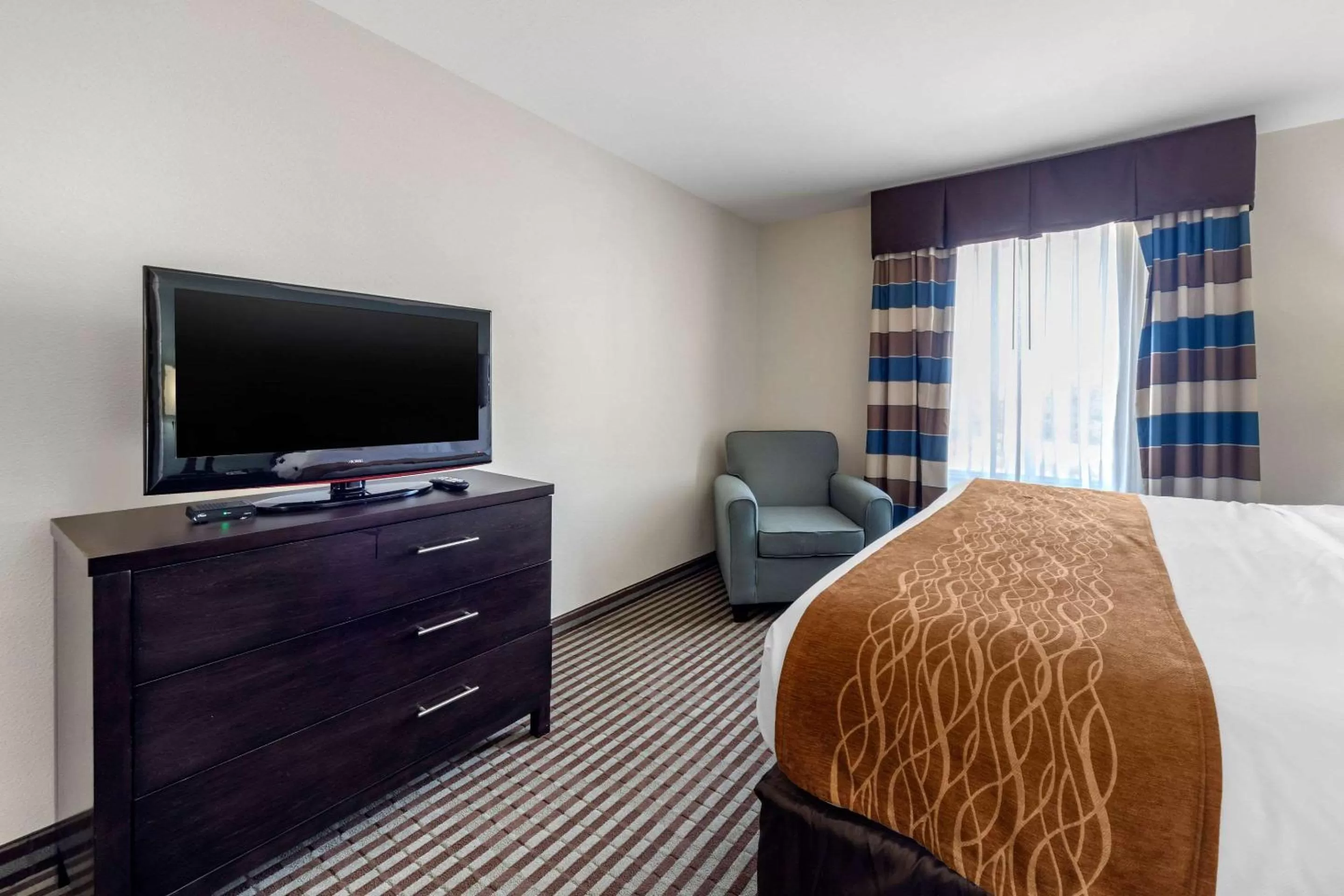 Photo of the whole room, Bed in Comfort Inn & Suites Perry I-35