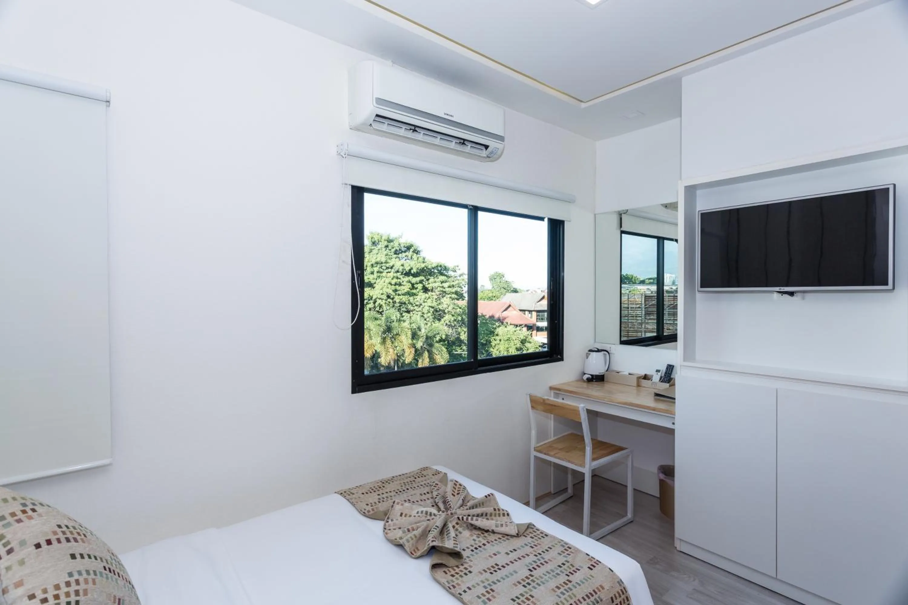 Bed in The Guest Arak Boutique Hotel