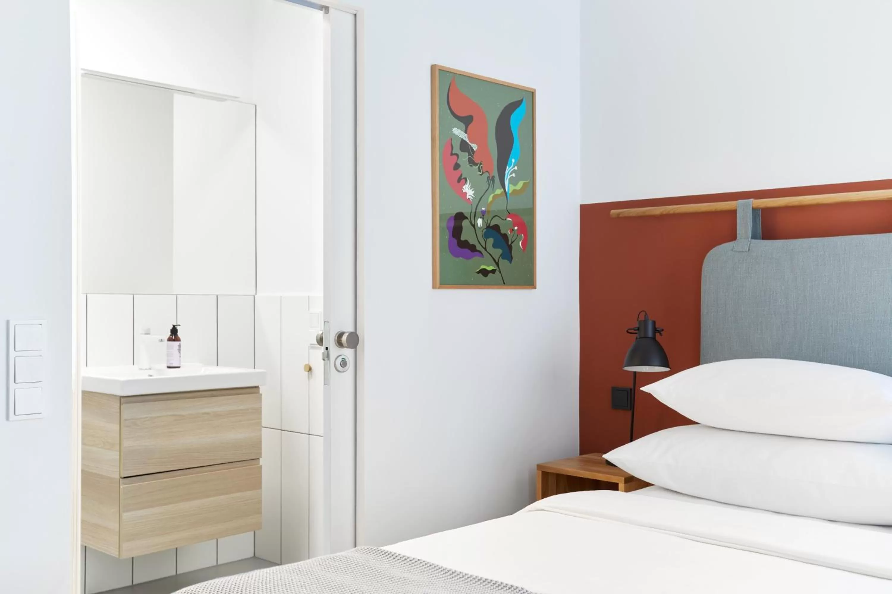 Bed in PLANTONIA Aparthotel