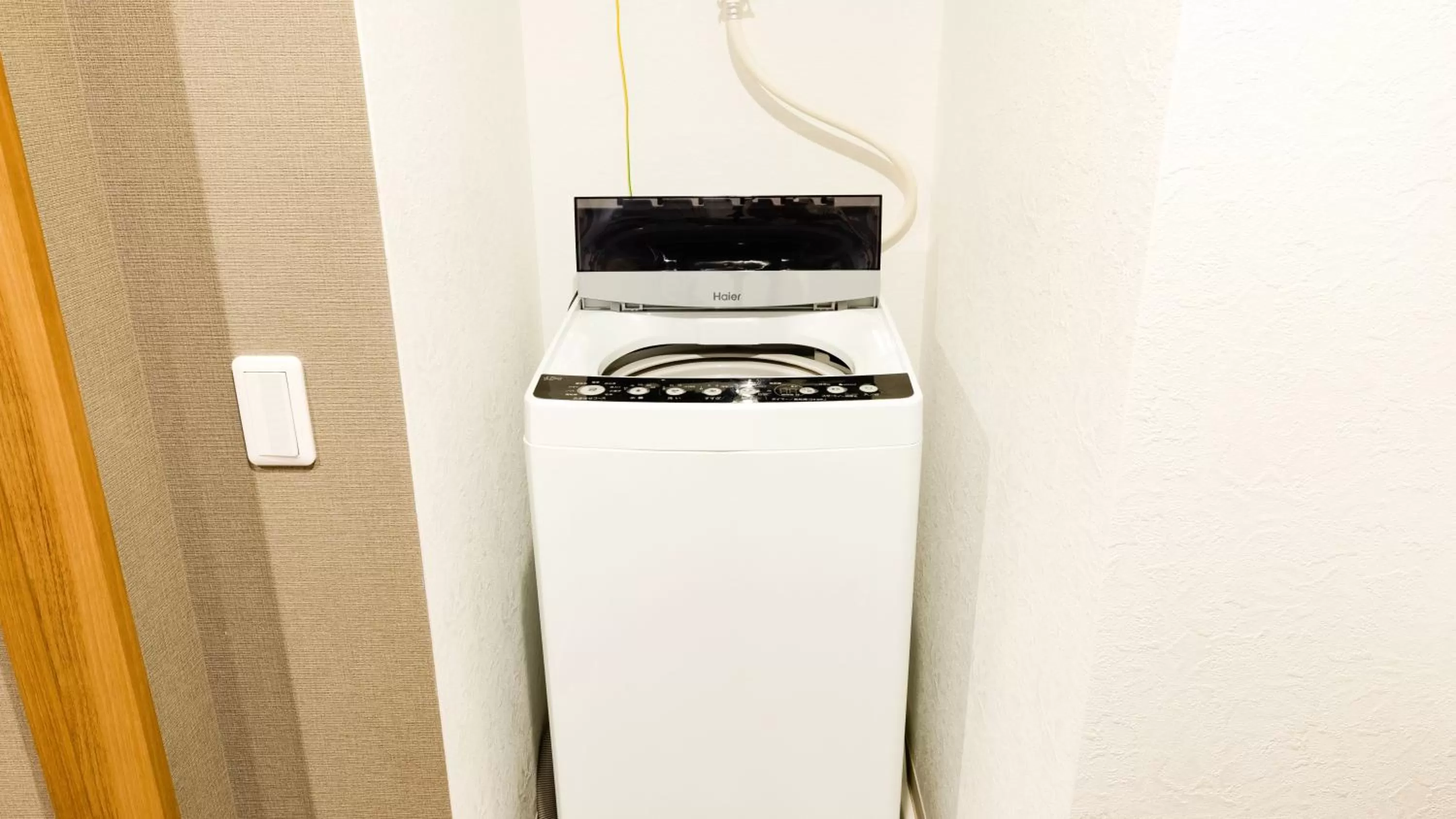 washing machine in Takuto Hotel Osaka Shinsaibashi