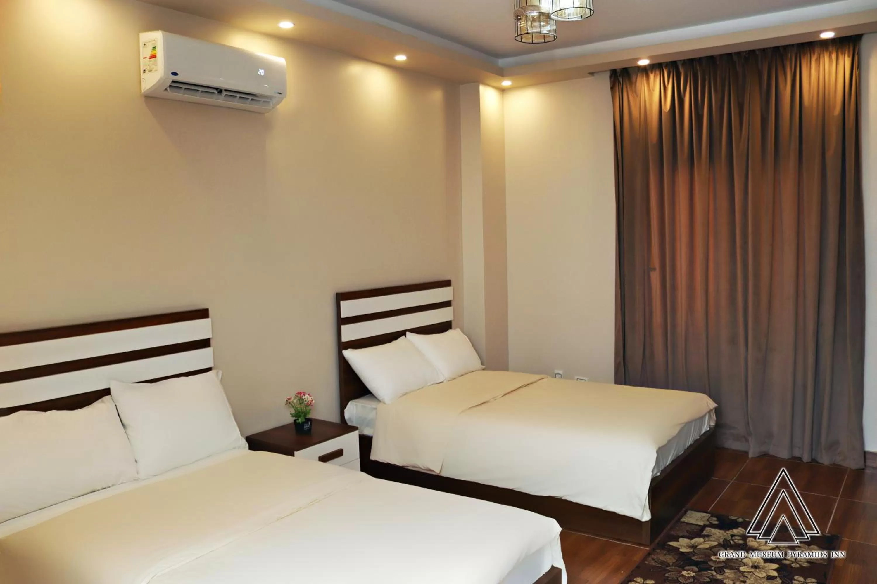 Bed in Grand Museum Pyramids Inn