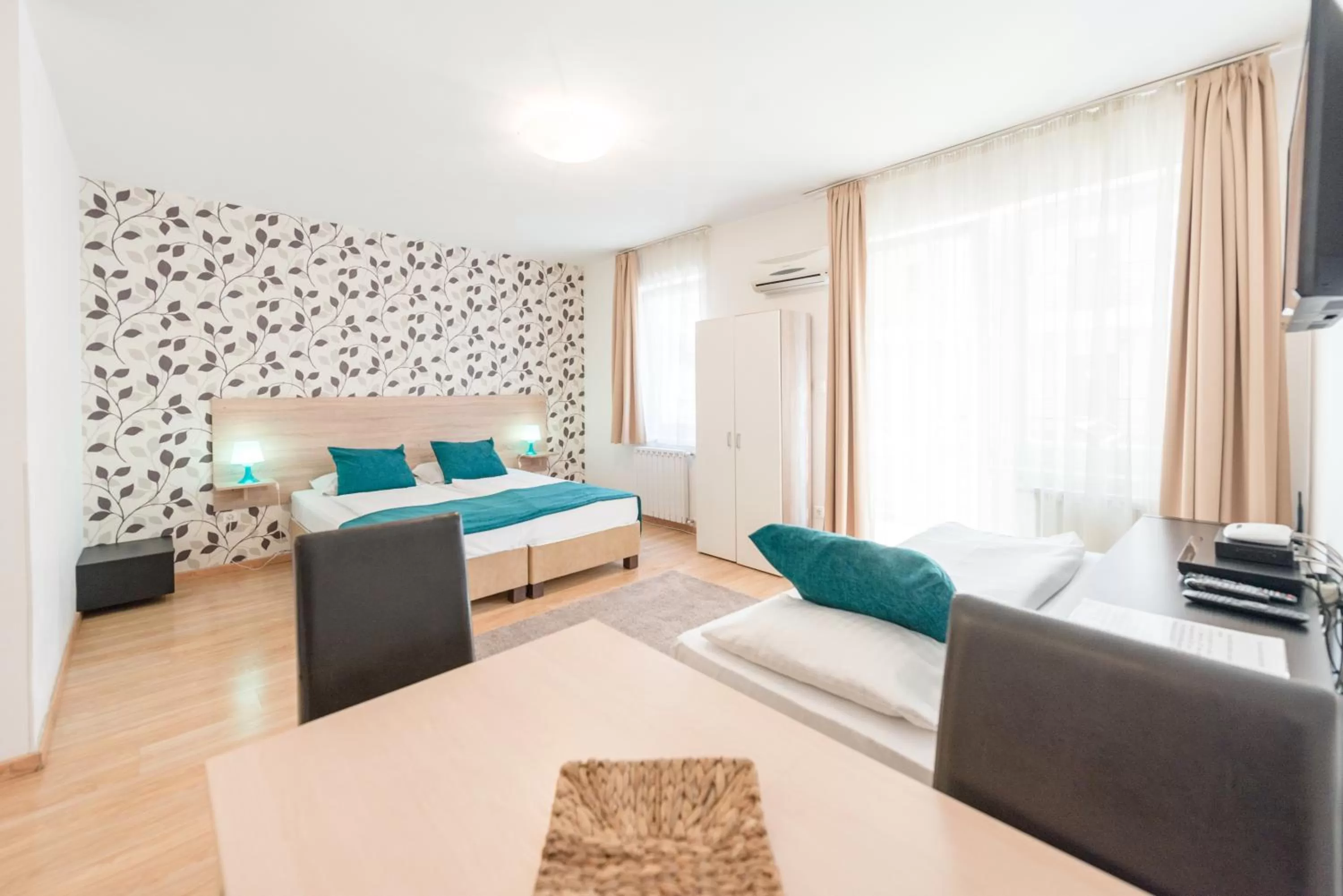 Living room, Bed in Prince Apartments