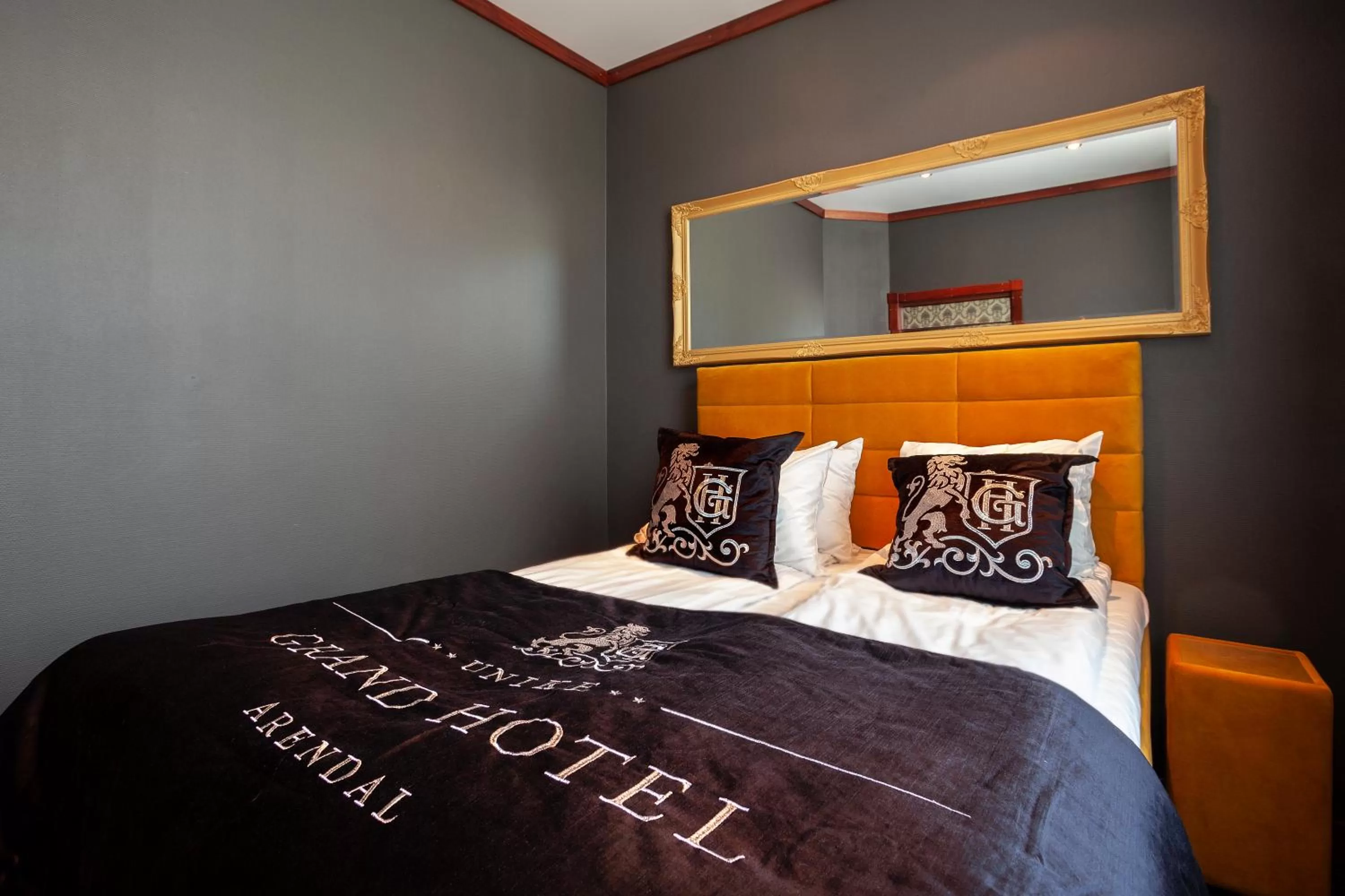 Bedroom, Bed in Grand Hotel Arendal - Unike Hoteller