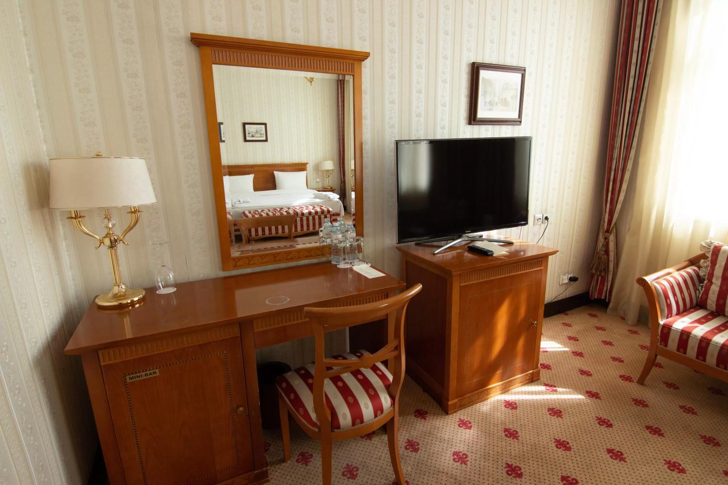 Bed in Grand Tien Shan Hotel