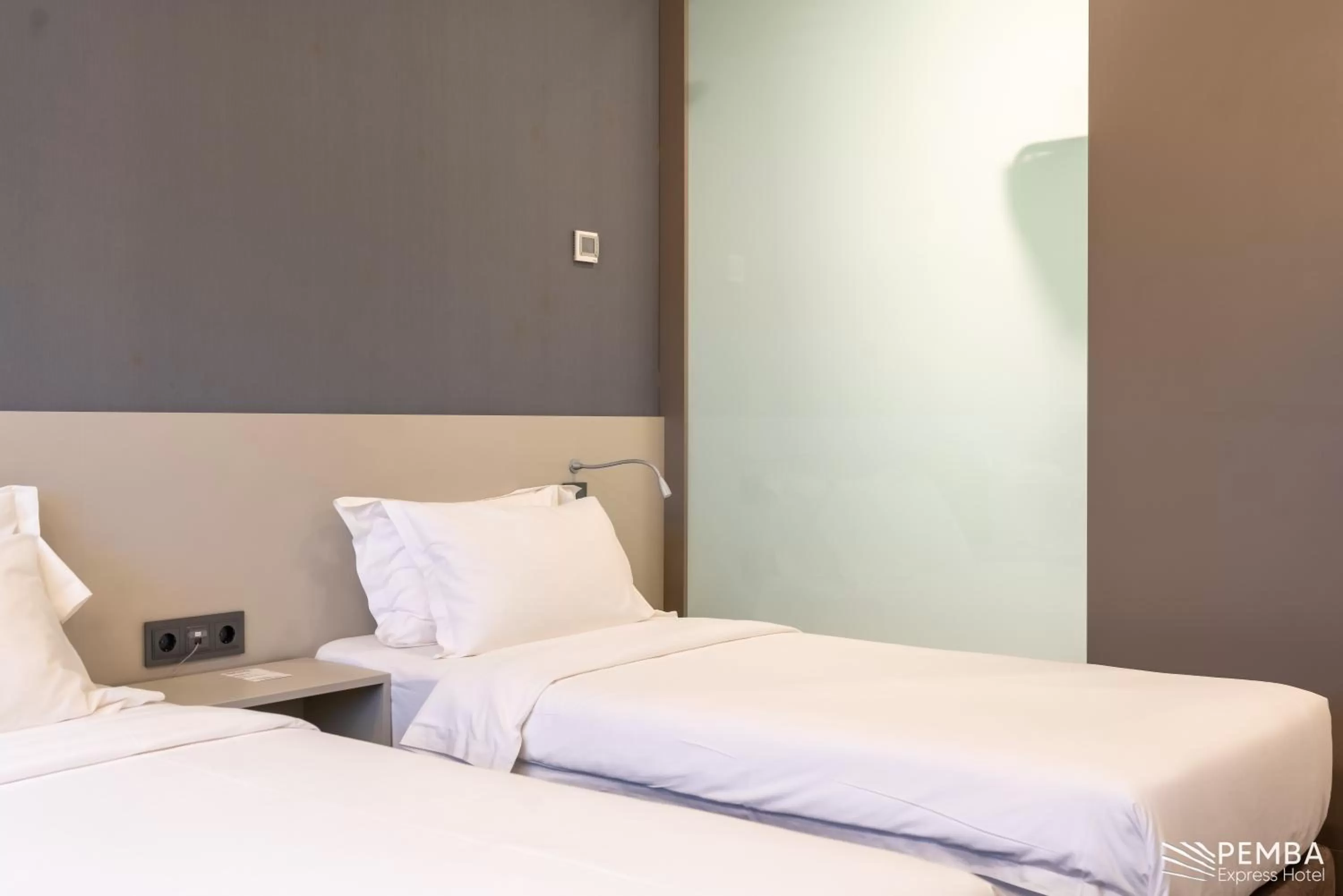 Bed in Pemba Express Hotel