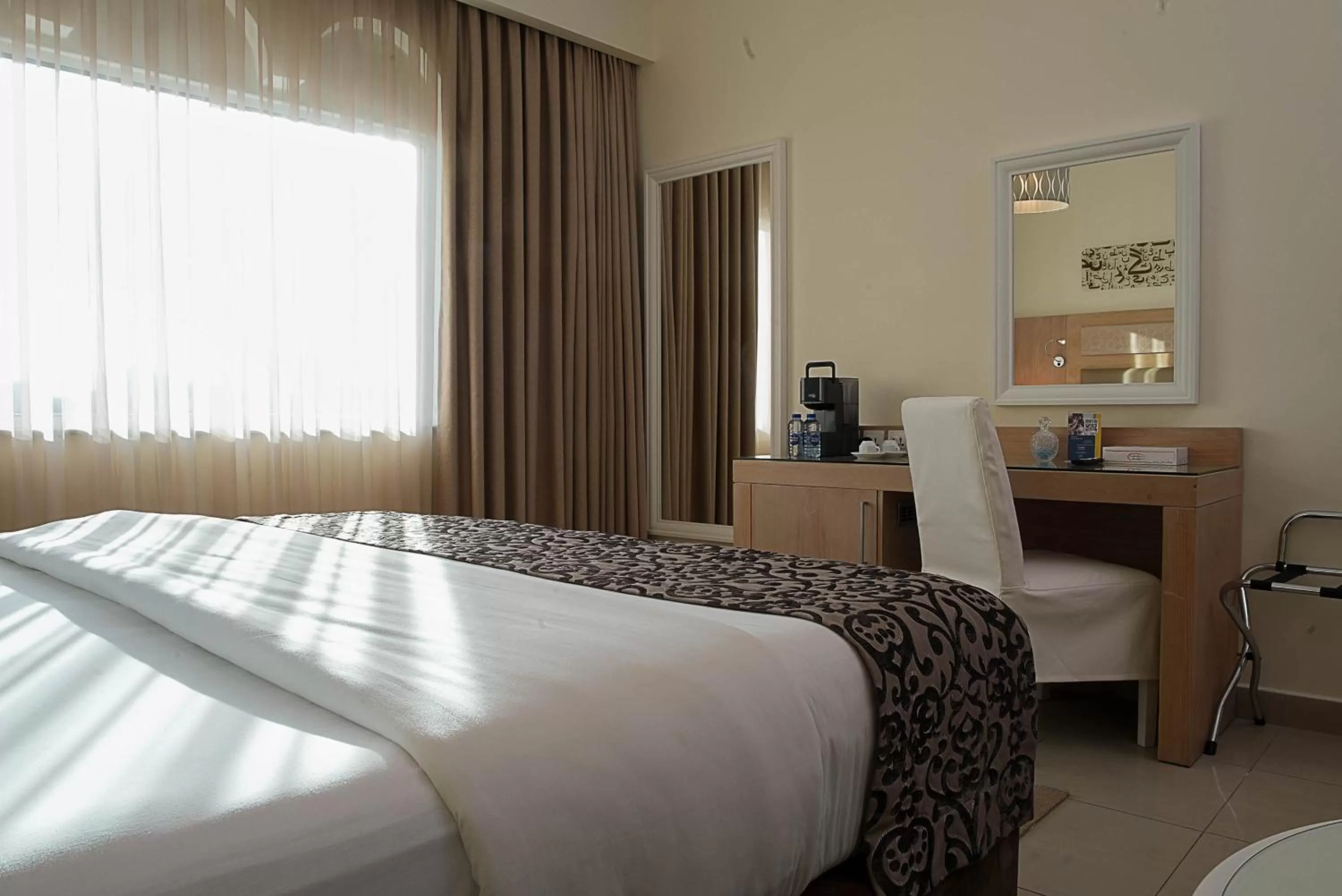 Bed in Toledo Amman Hotel