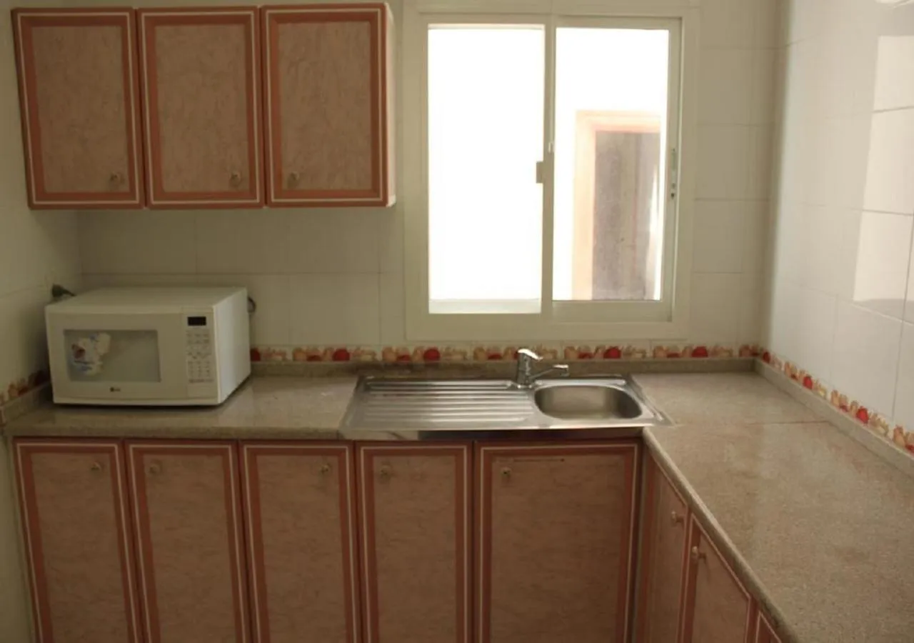 Kitchen or kitchenette in Royal Residence Hotel Apartments