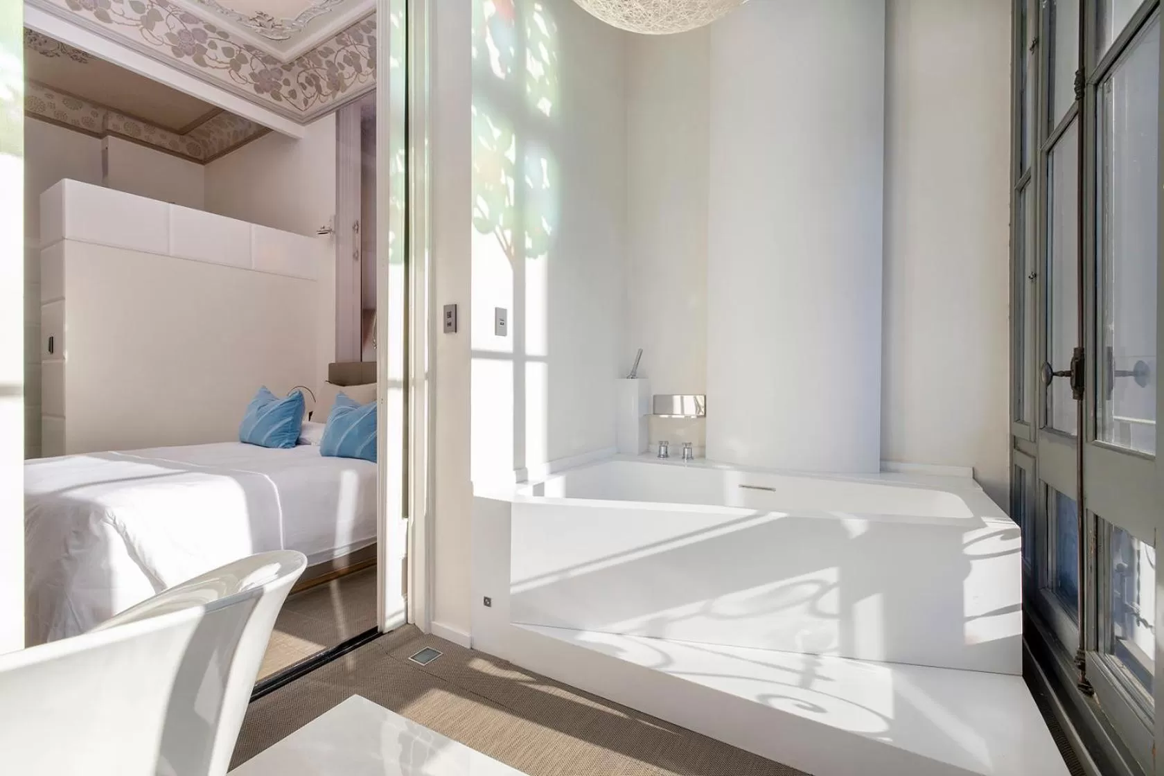 Bed in El Palauet Modernist Suites Barcelona