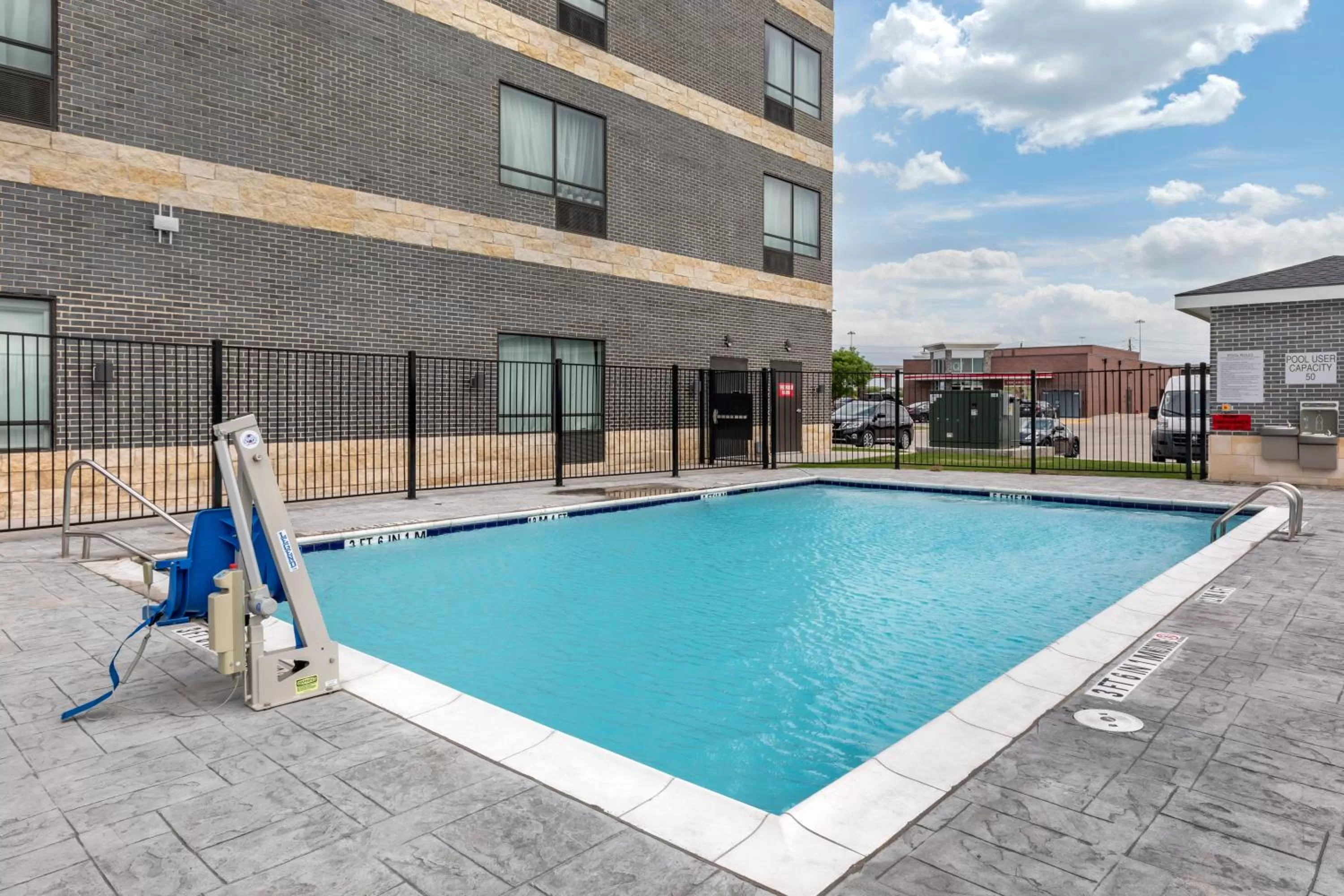 Swimming pool in Staybridge Suites Grand Prairie Near Epic Central by IHG