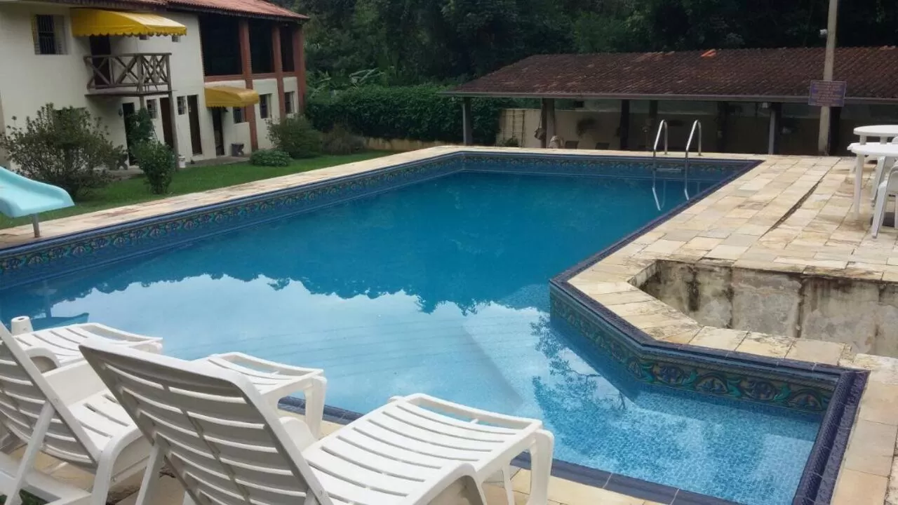 Property building, Swimming Pool in Abaete Pousada da Estancia