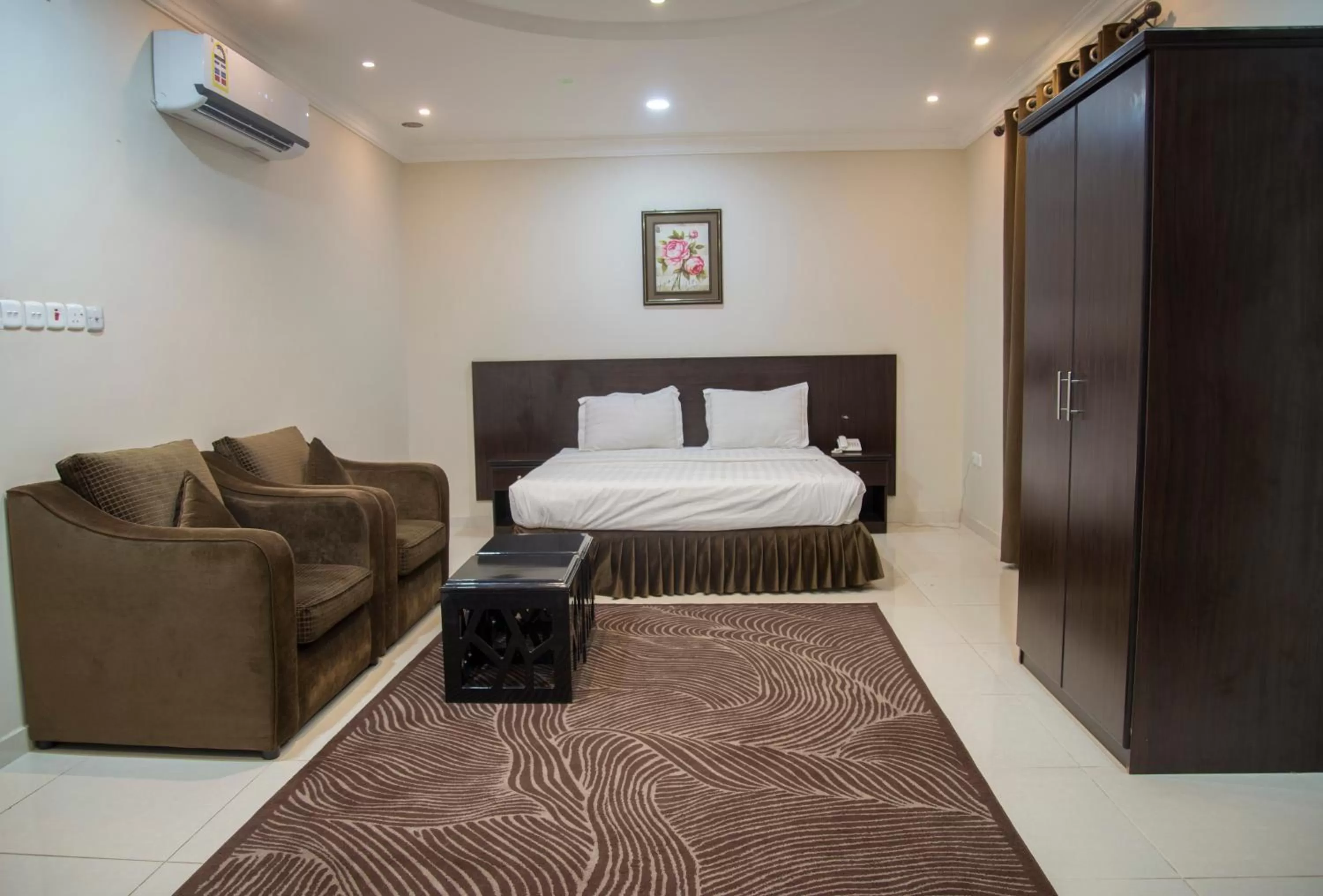 Bedroom, Bed in Shams Suites Furnished Units