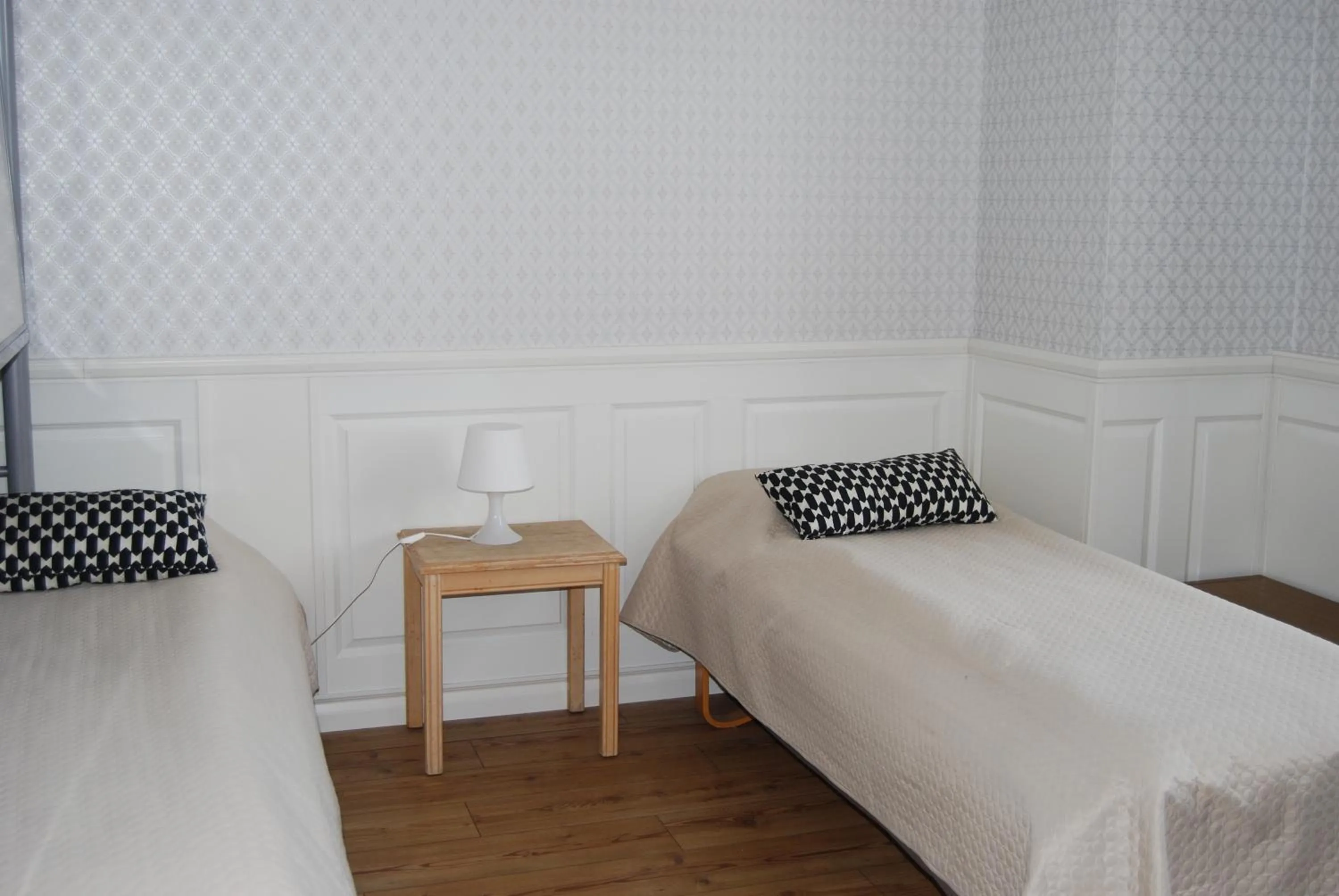 Bed in Halmstad Hotell & Vandrarhem Kaptenshamn