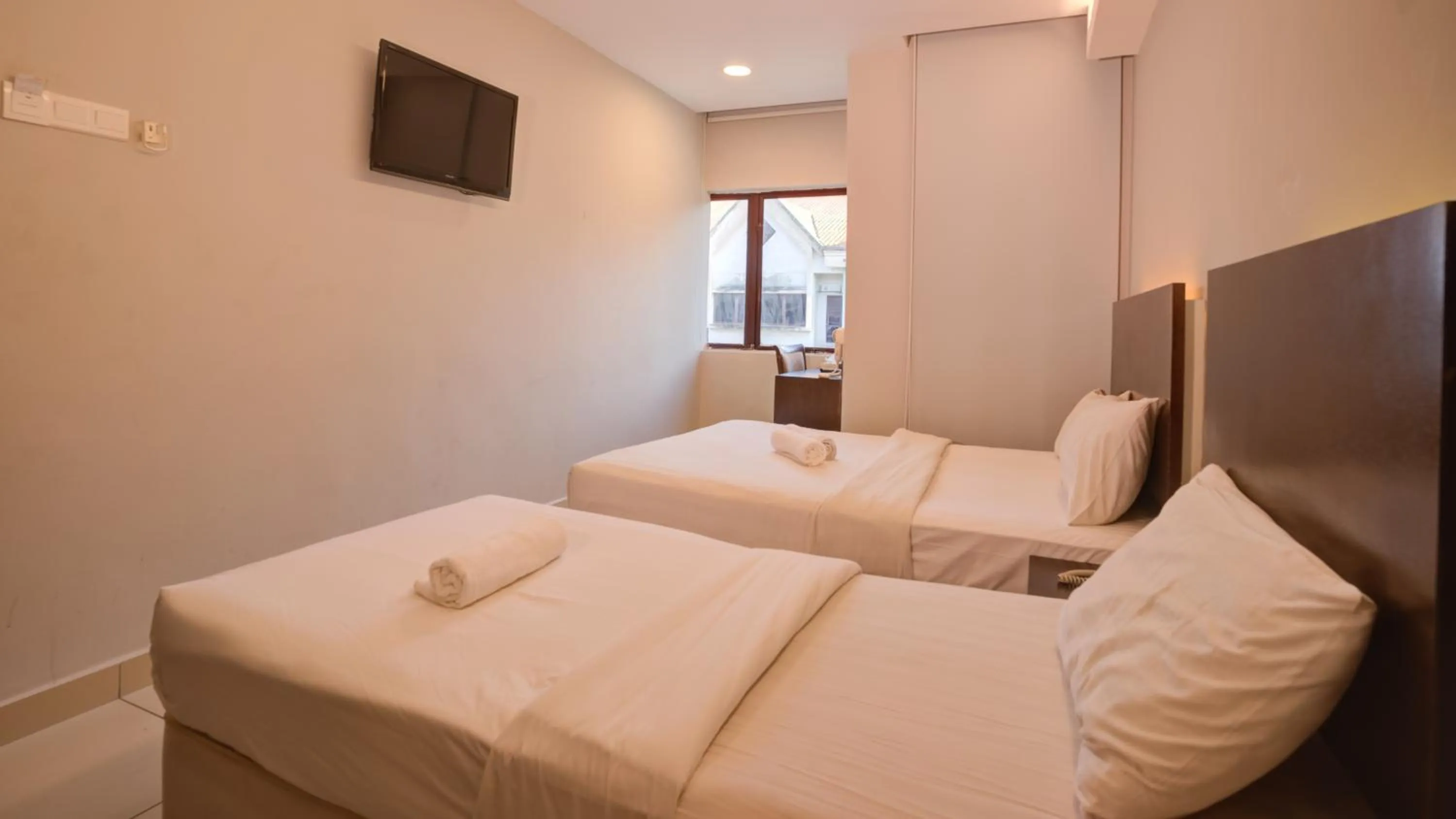 Bed in GM Hotel Metro at Sunway