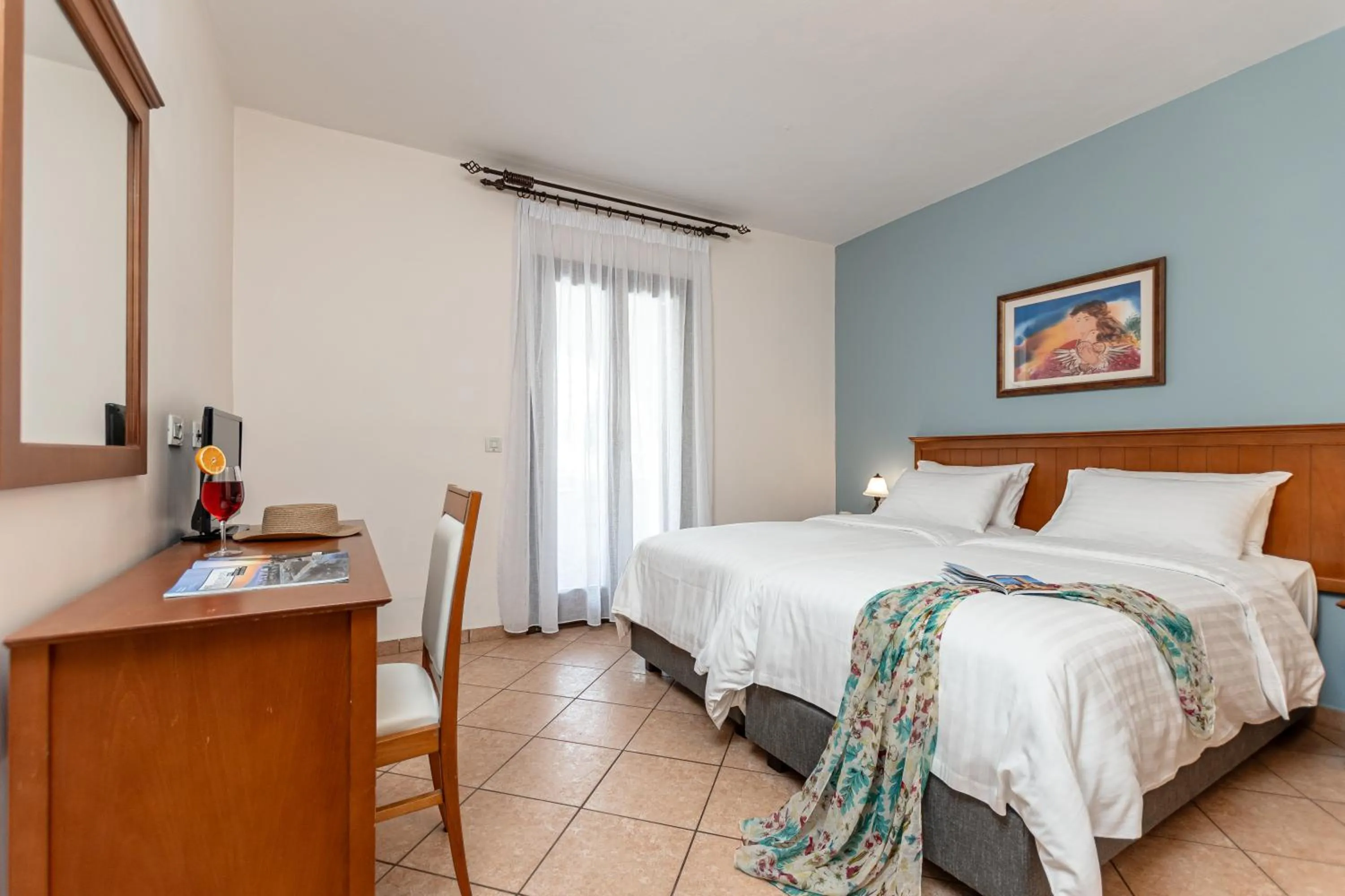 Bedroom in Naxos Resort Beach Hotel