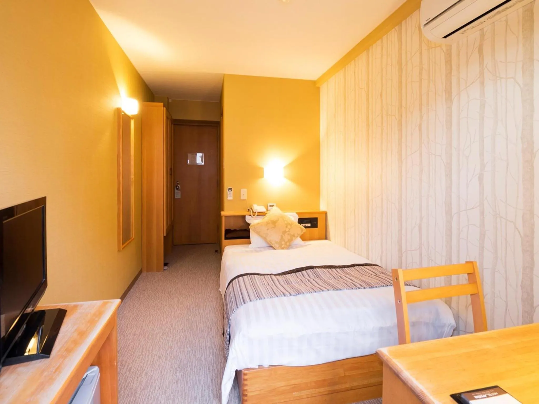 Photo of the whole room, Bed in Hotel AreaOne Kushiro
